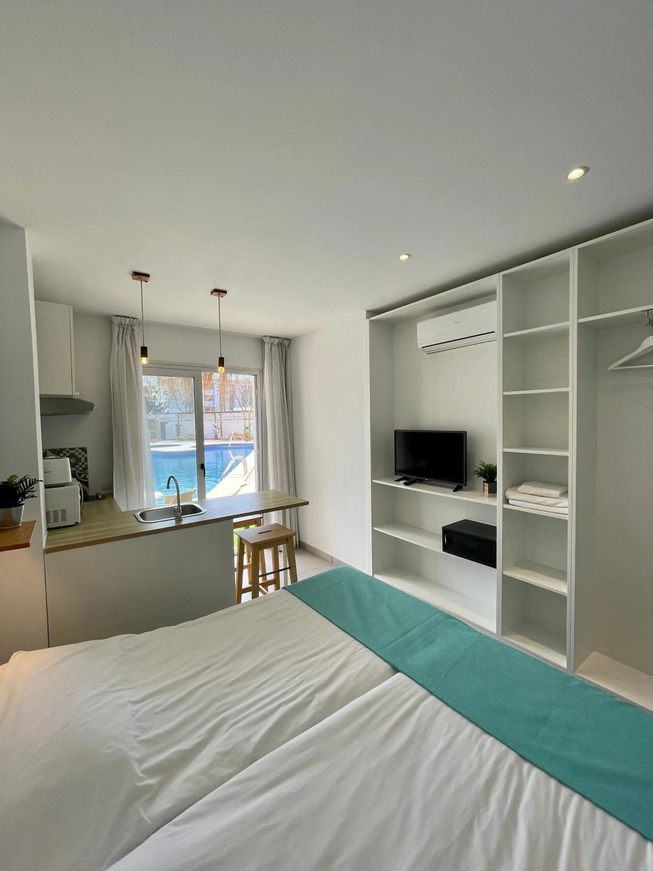 Bed in Apartaments La Perla Negra