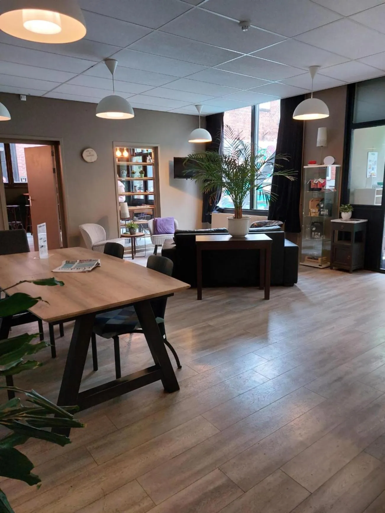 Communal lounge/ TV room in Simplon Hostel