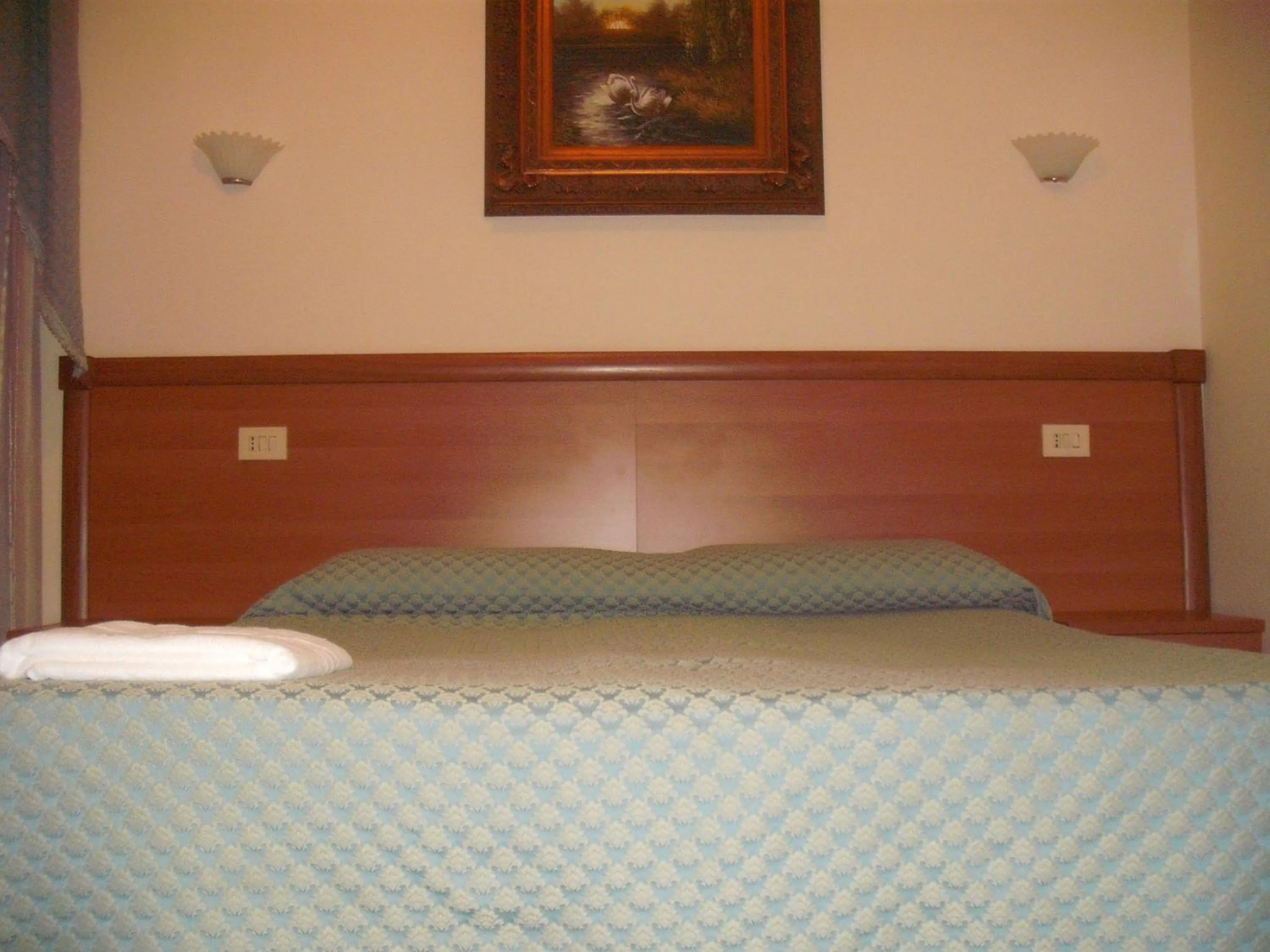 Bed in Ritmo Blues Guest House