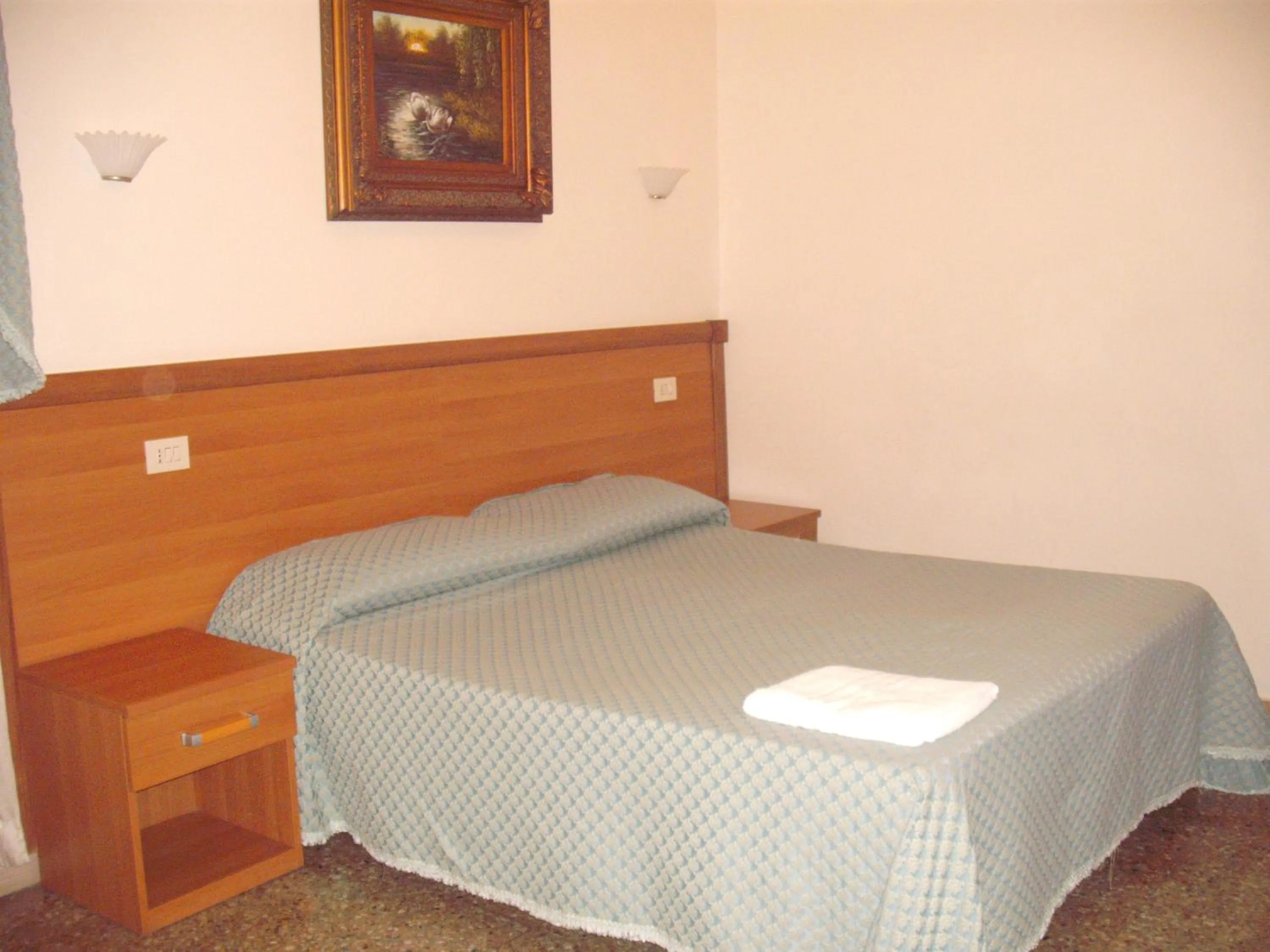 Bed in Ritmo Blues Guest House
