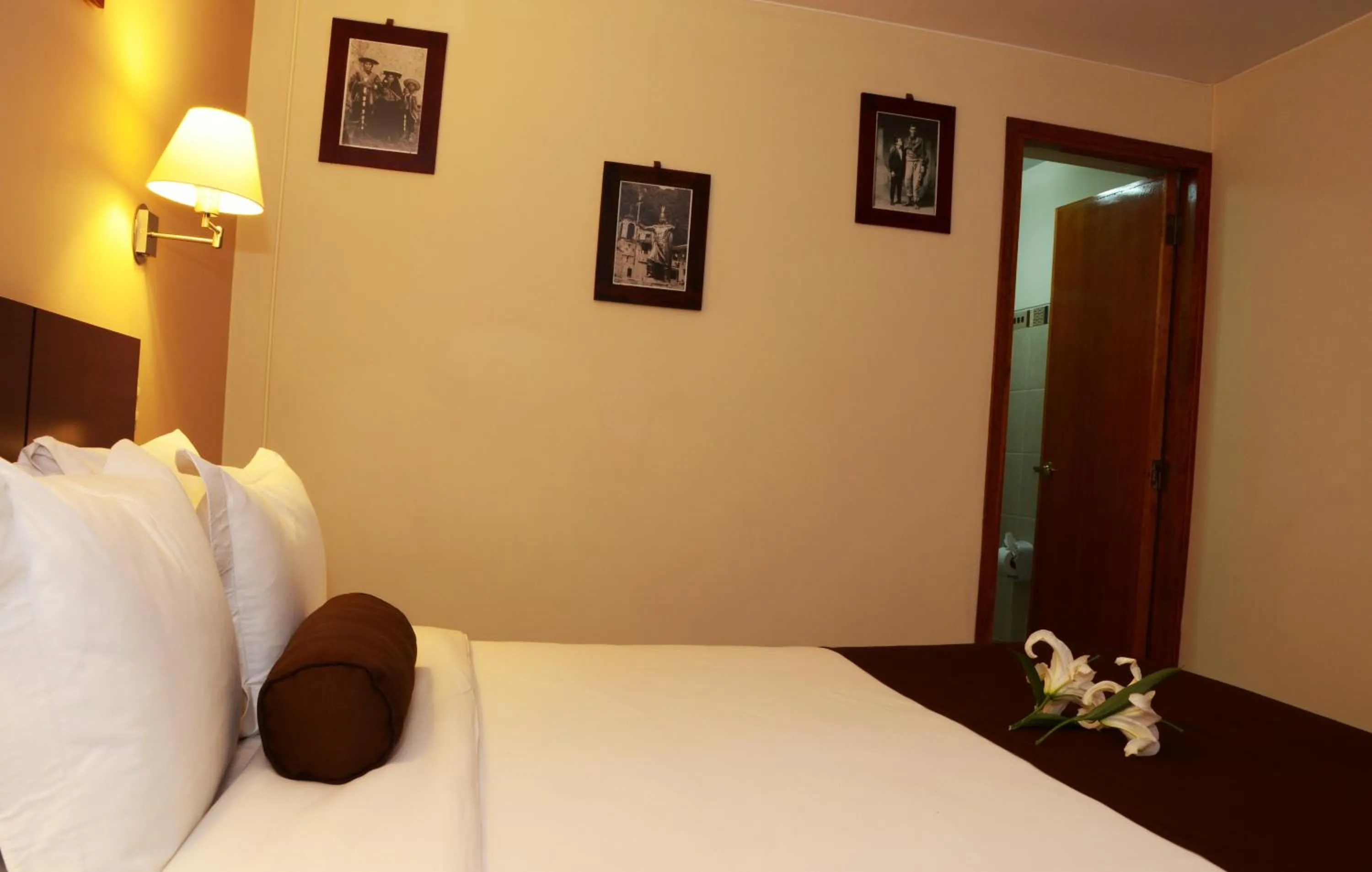 Bed in Kapac Inn Hotel