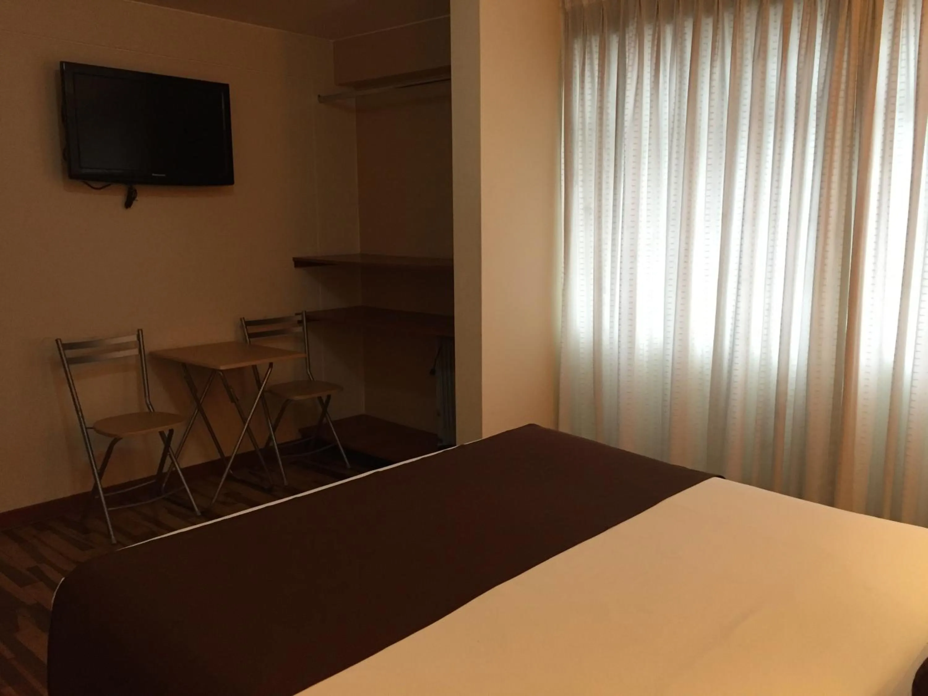 Bed in Kapac Inn Hotel