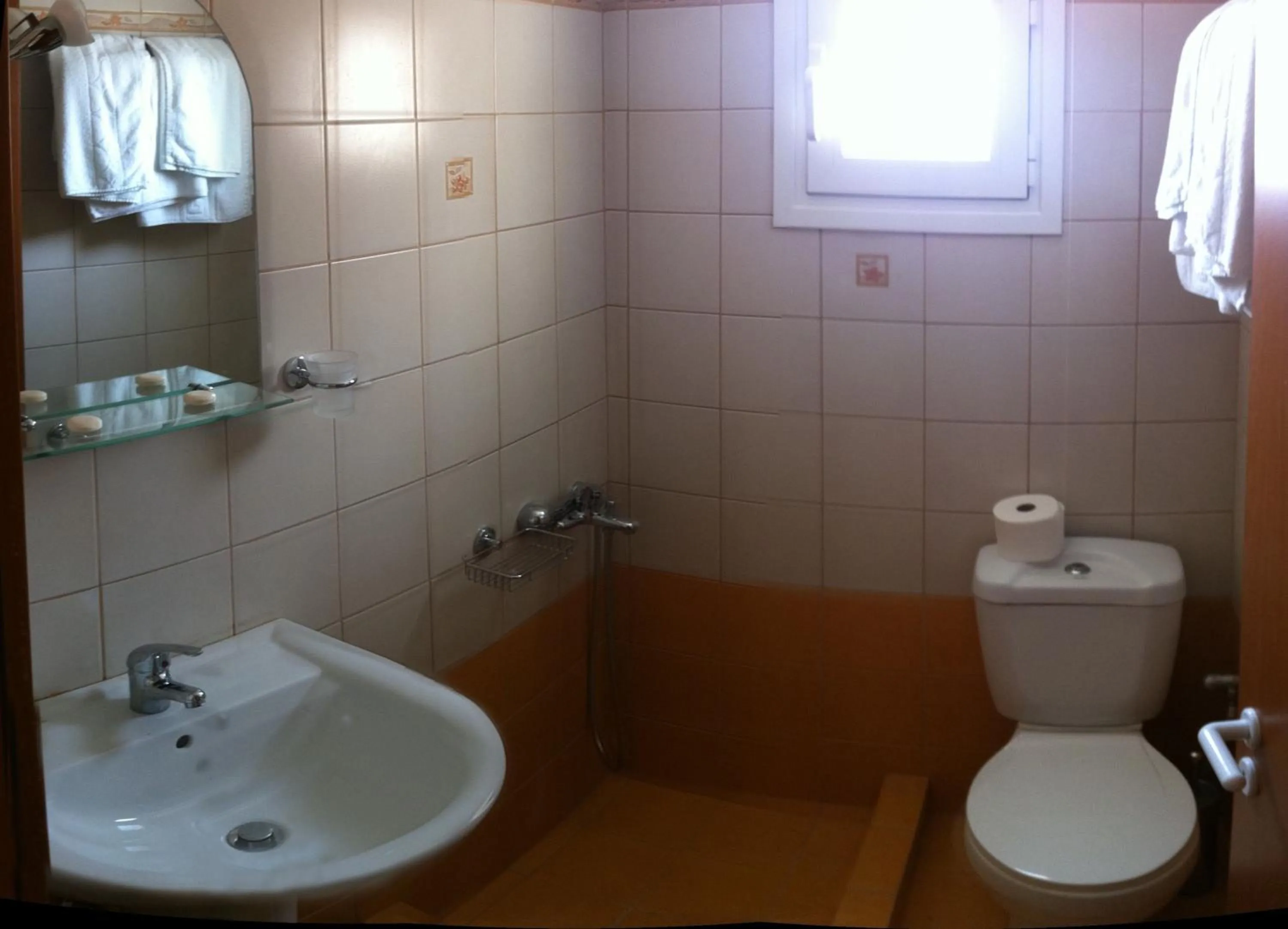 Bathroom in Ariadni Hotel Arvi by Estia