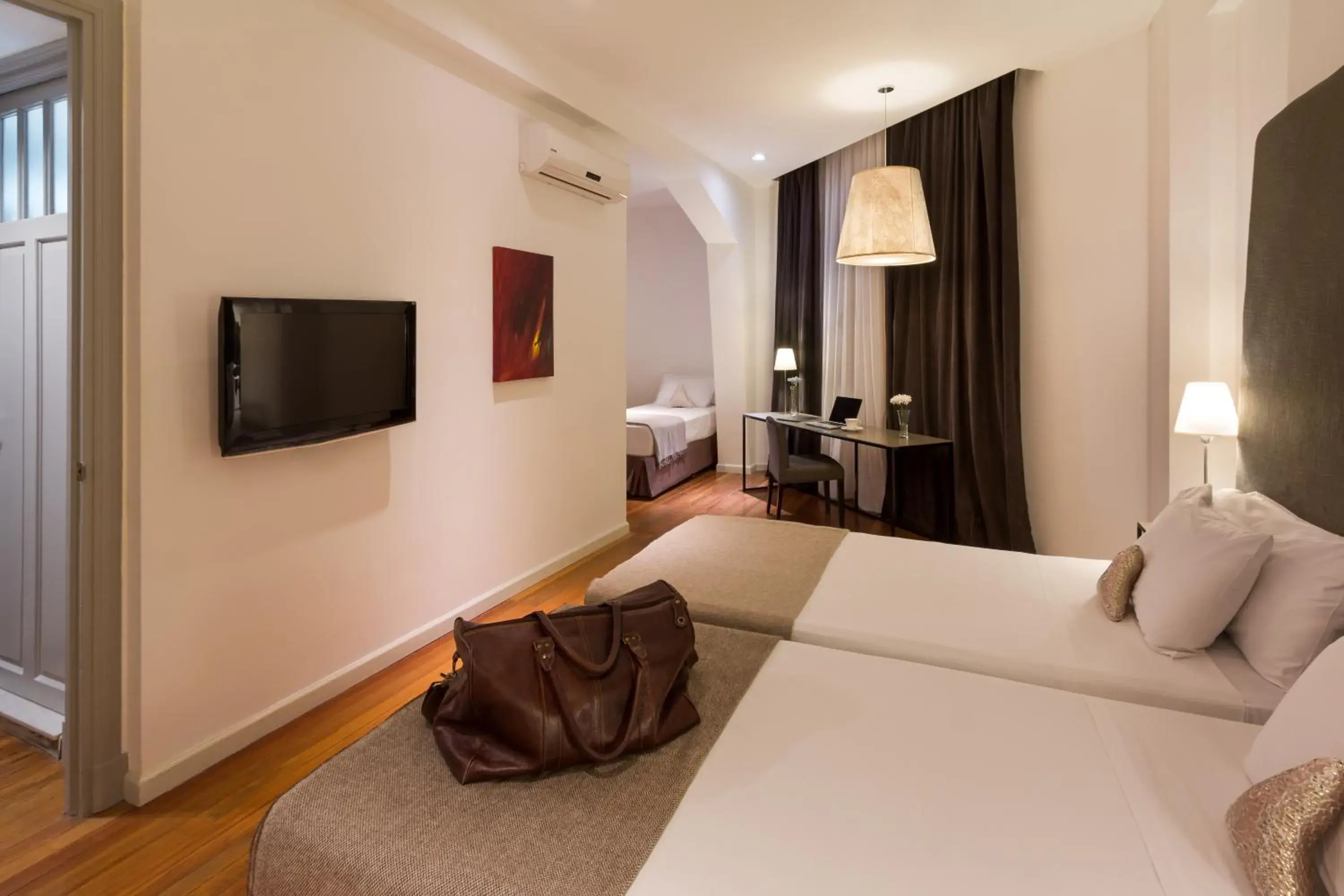 Suite with 3 Twin Beds in Esplendor by Wyndham Montevideo Cervantes Suite with 3 Twin Beds in Esplendor by Wyndham Montevideo Cervantes