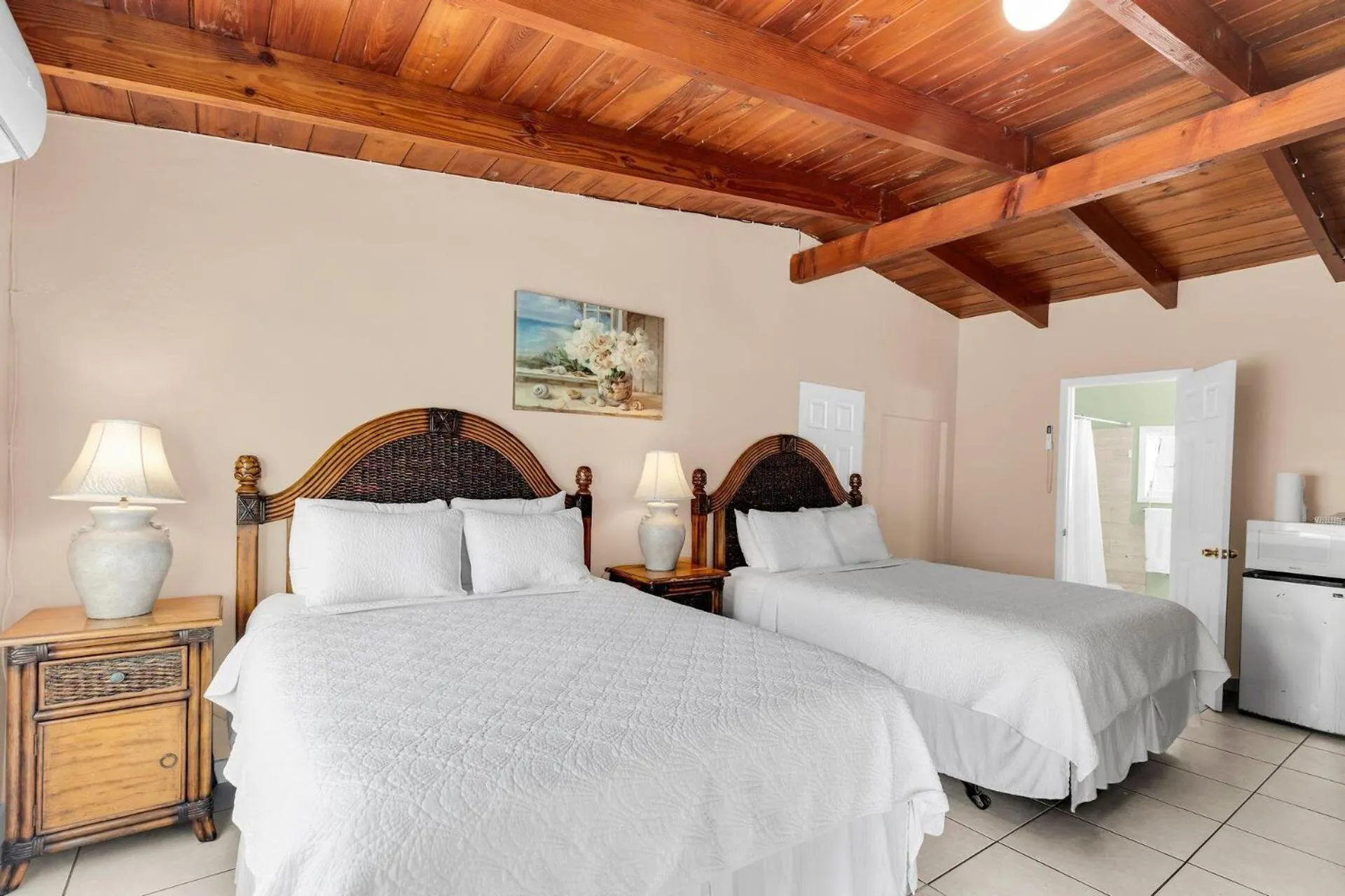 Bed in Tropical Cottages