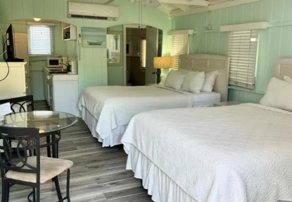 Bed in Tropical Cottages