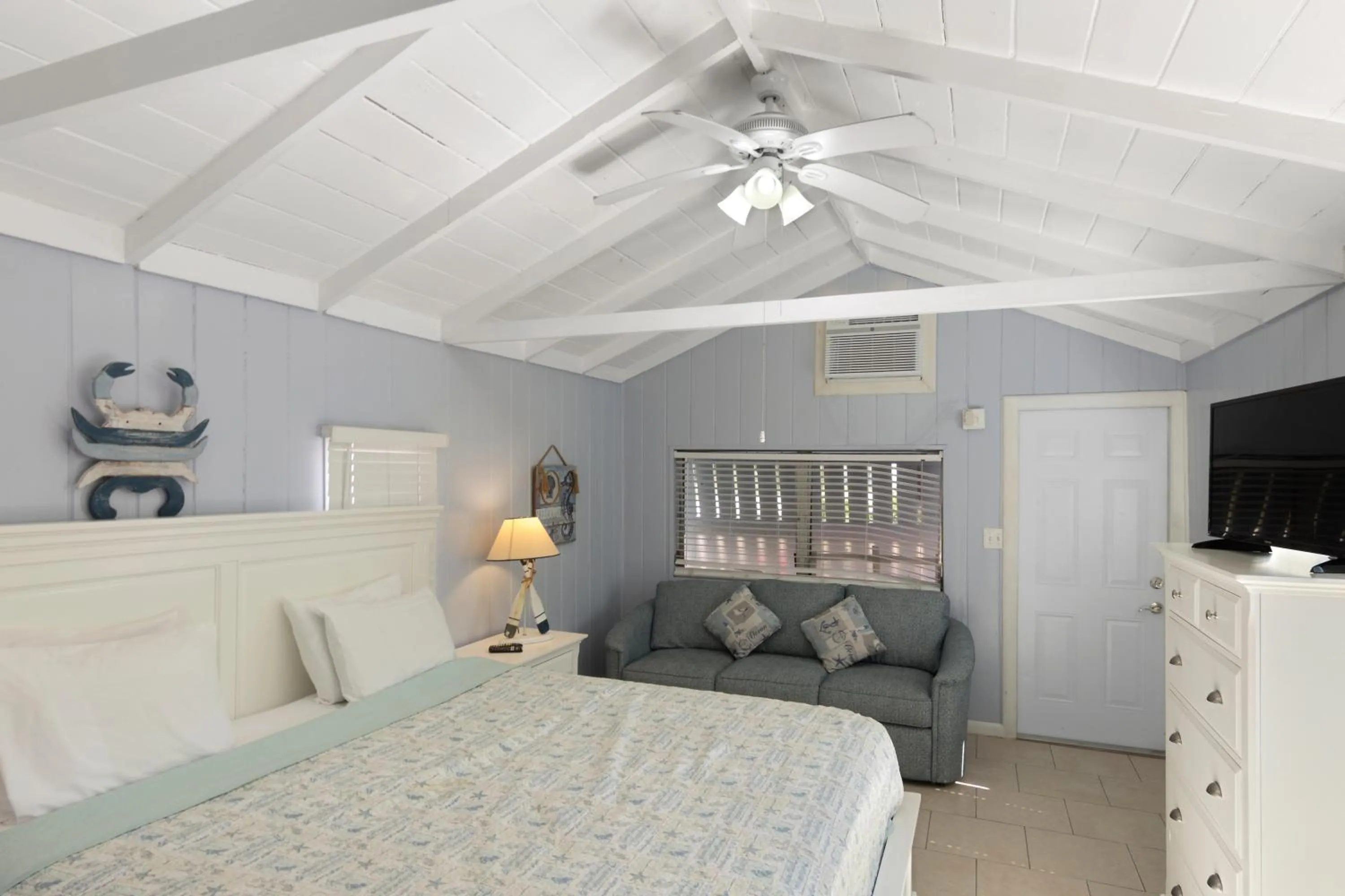 Bed in Tropical Cottages