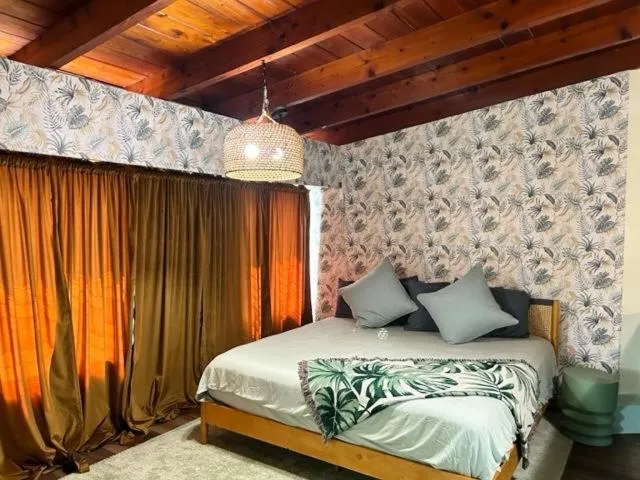 Bed in Tropical Cottages