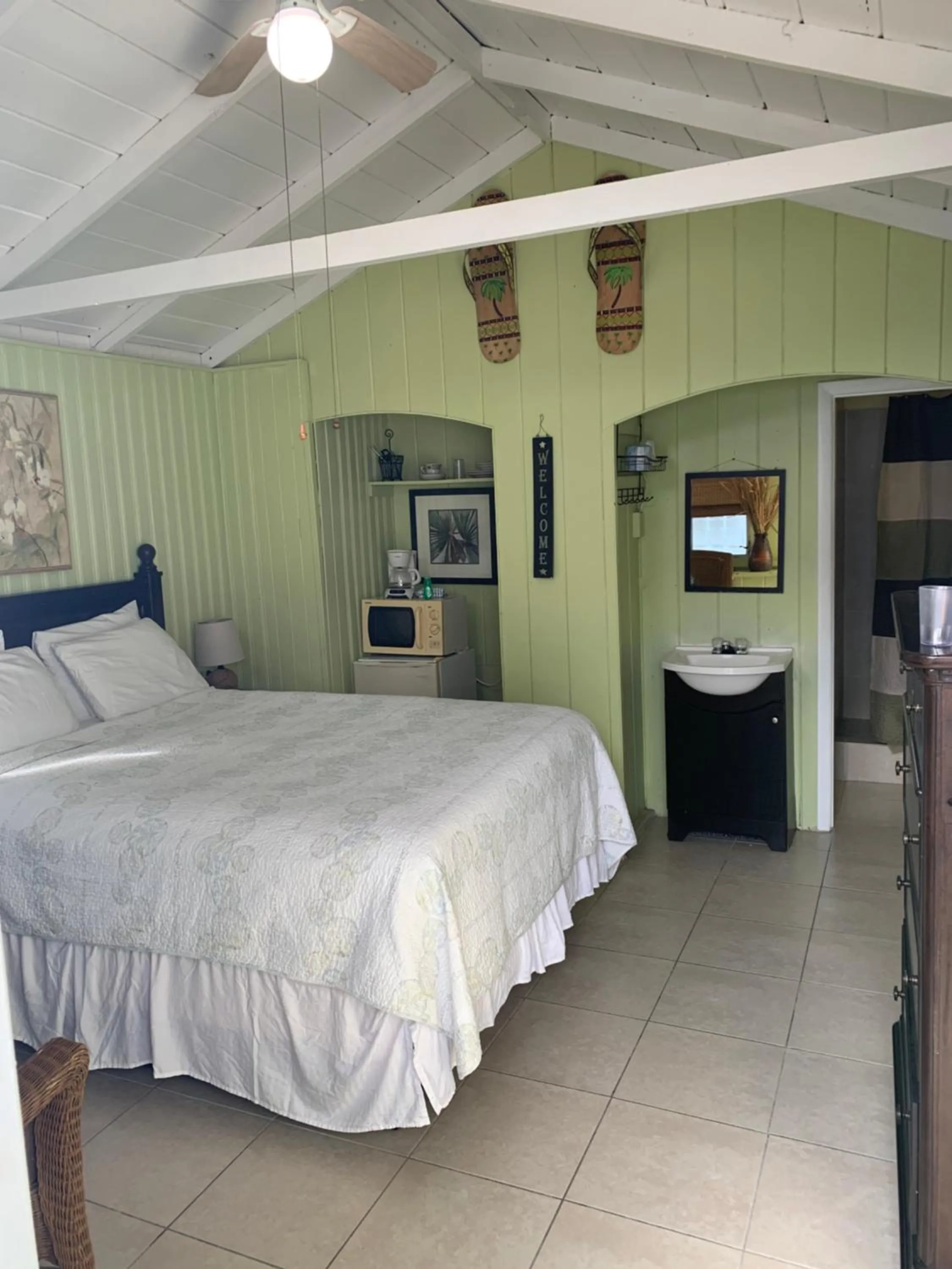 Bed in Tropical Cottages