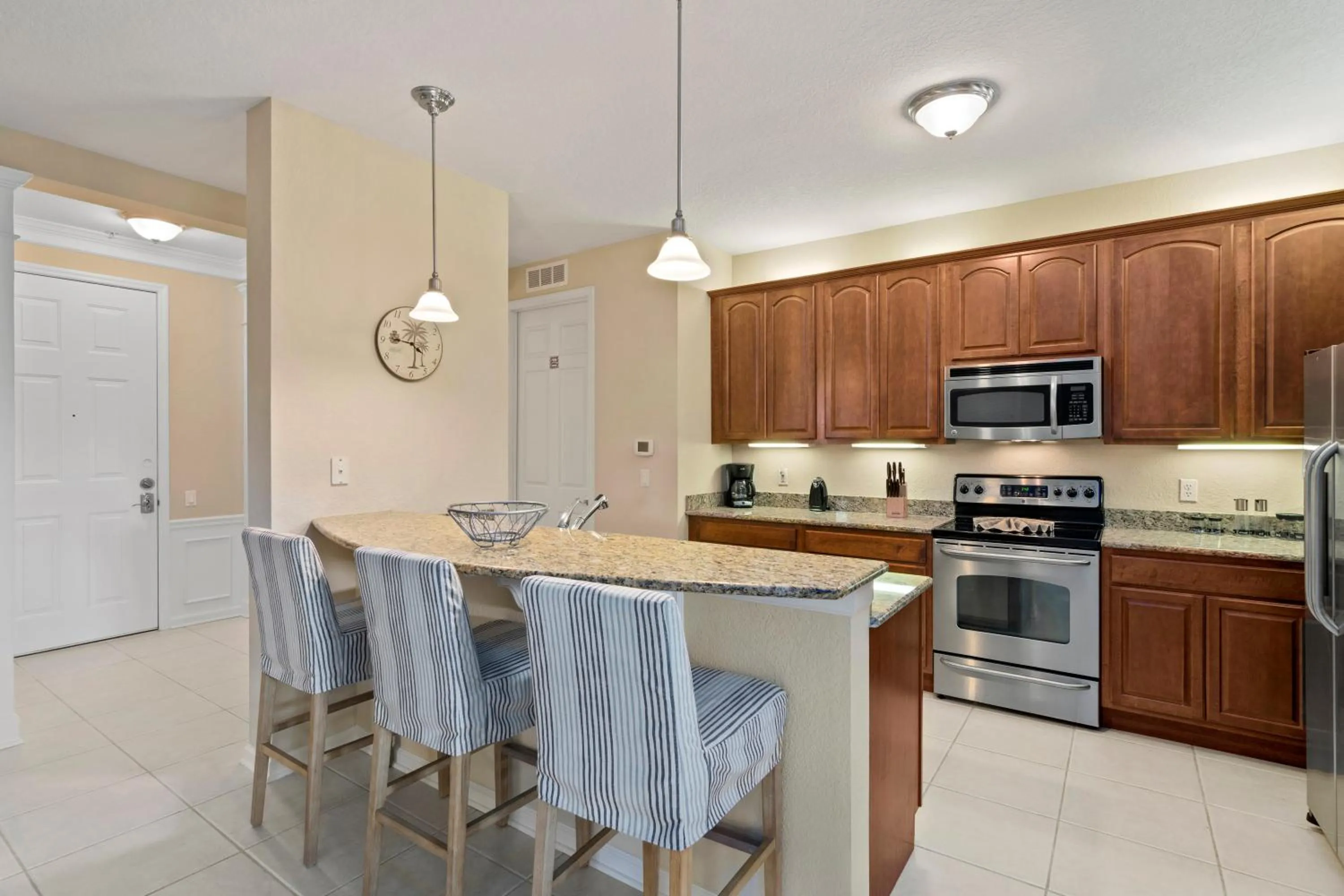 Kitchen or kitchenette in Orlando Resort Rentals at Universal Boulevard