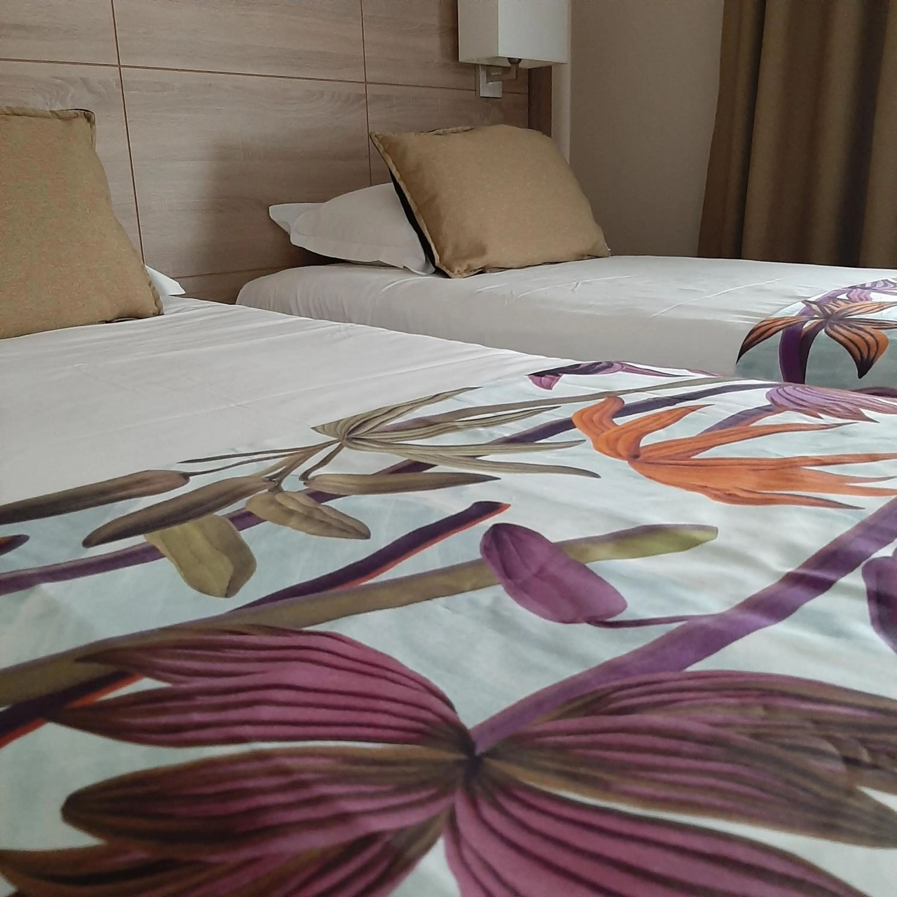 Bed in Logis Hotel Relais Saint Jacques - Châteauroux