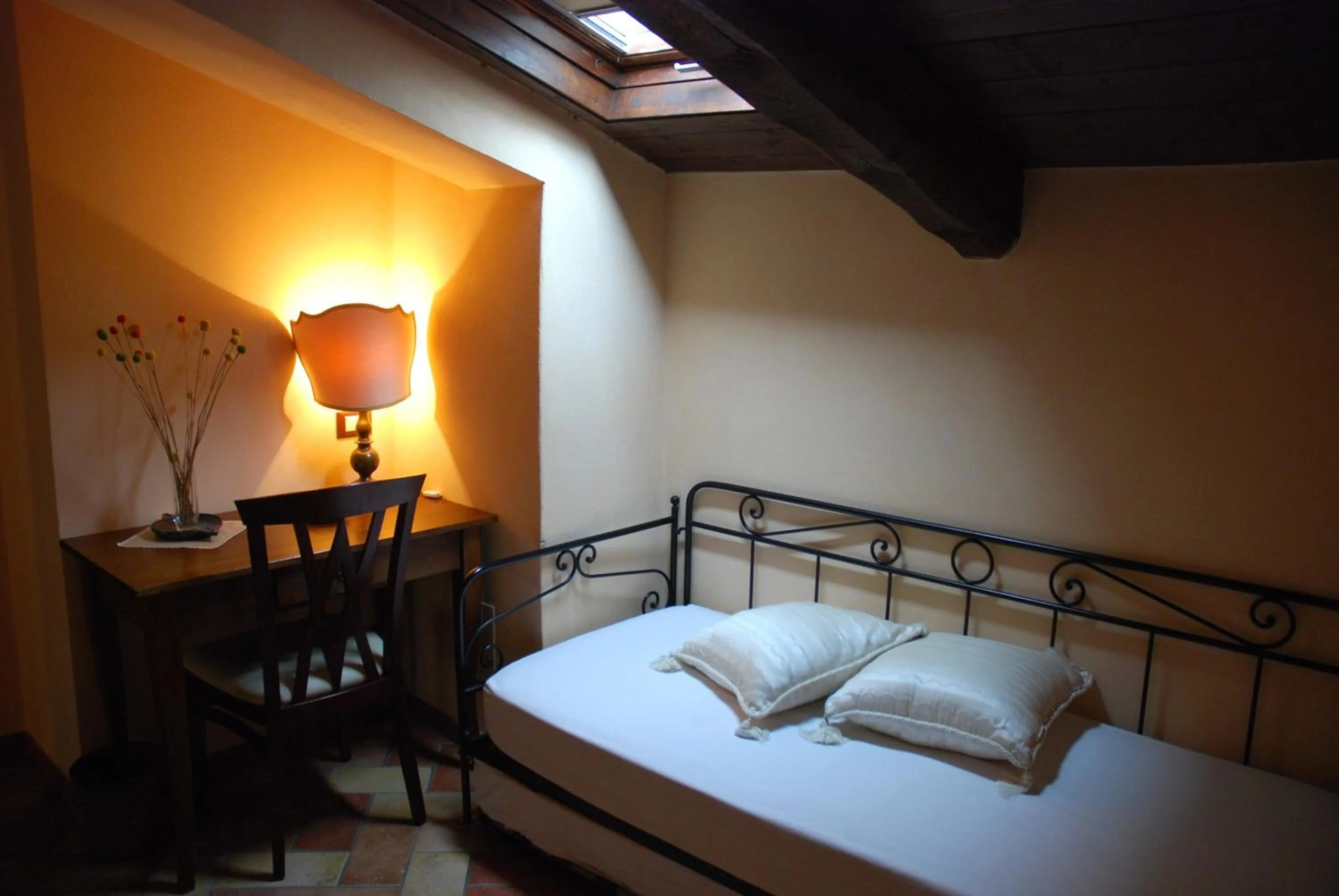 Decorative detail, Bed in Locanda Le Logge