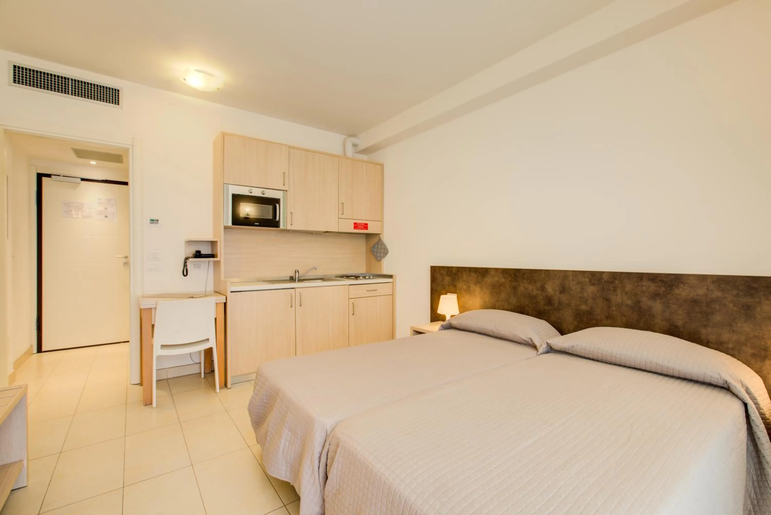 Kitchen or kitchenette, Bed in Wally Residence