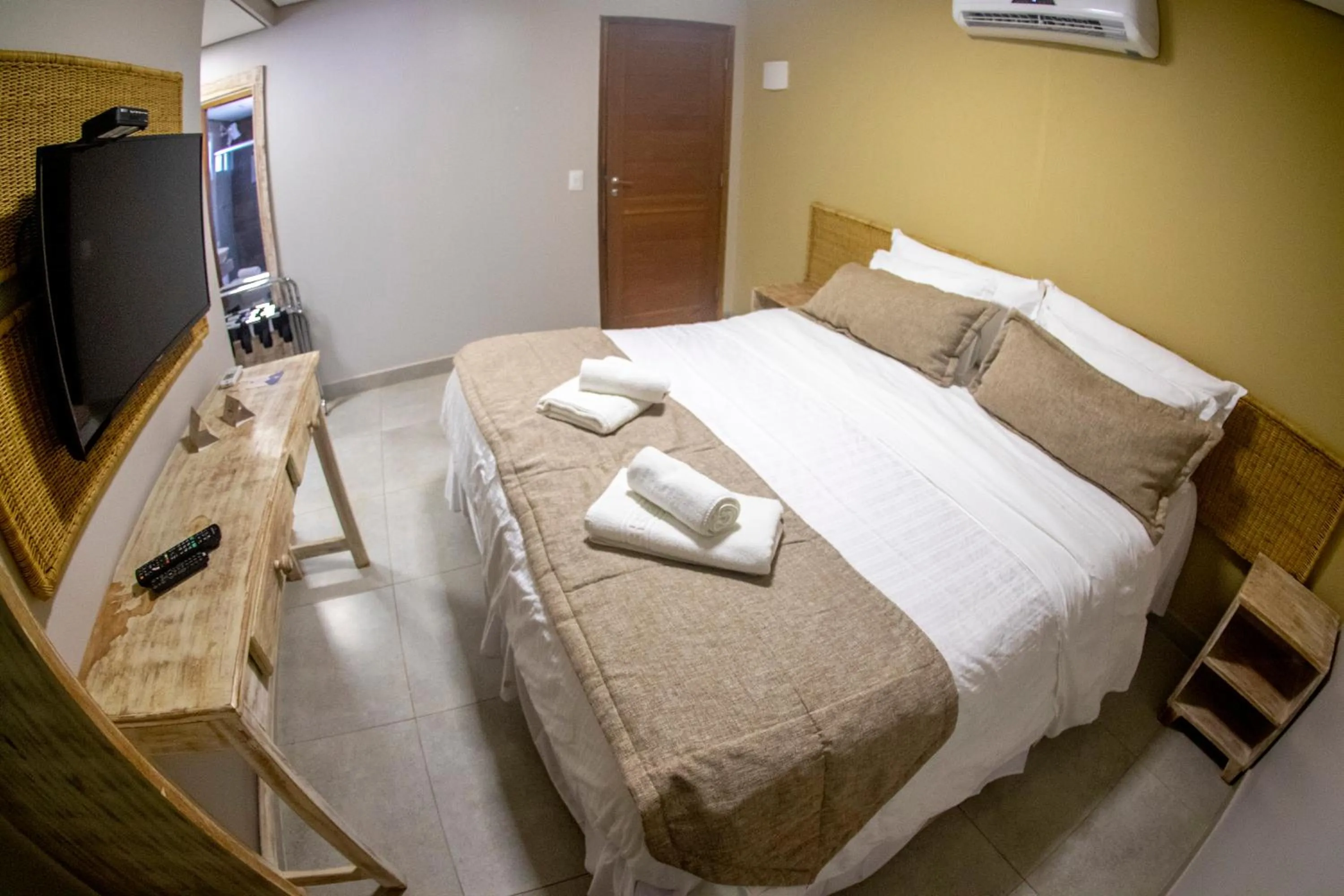 Bed in Pousada Recanto