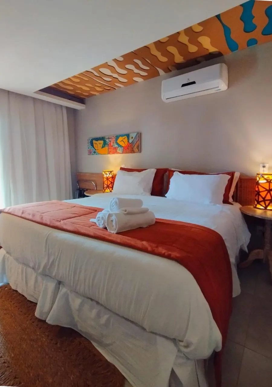 Bed in Pousada Recanto