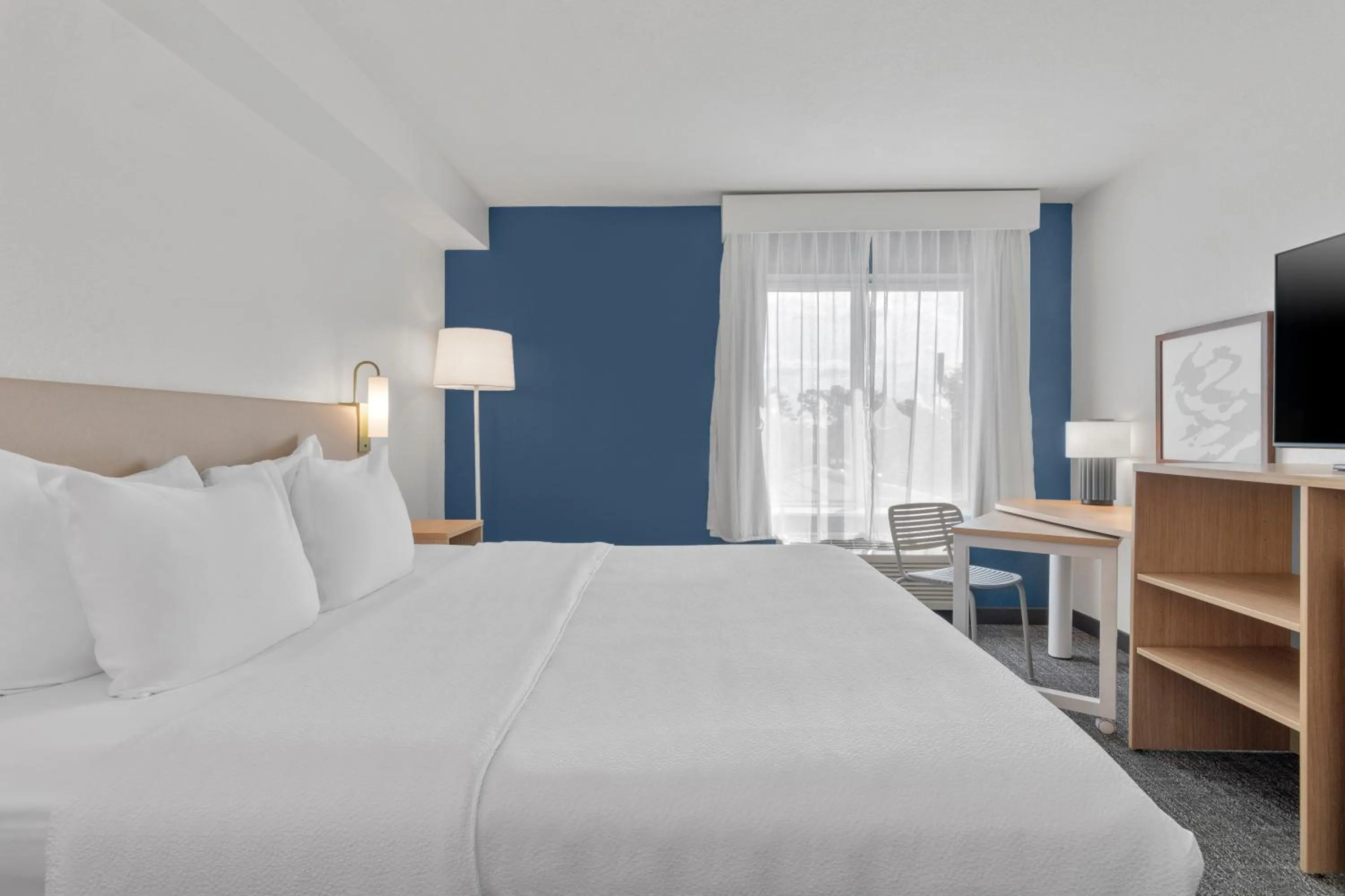 Photo of the whole room, Bed in Spark by Hilton Orlando near SeaWorld