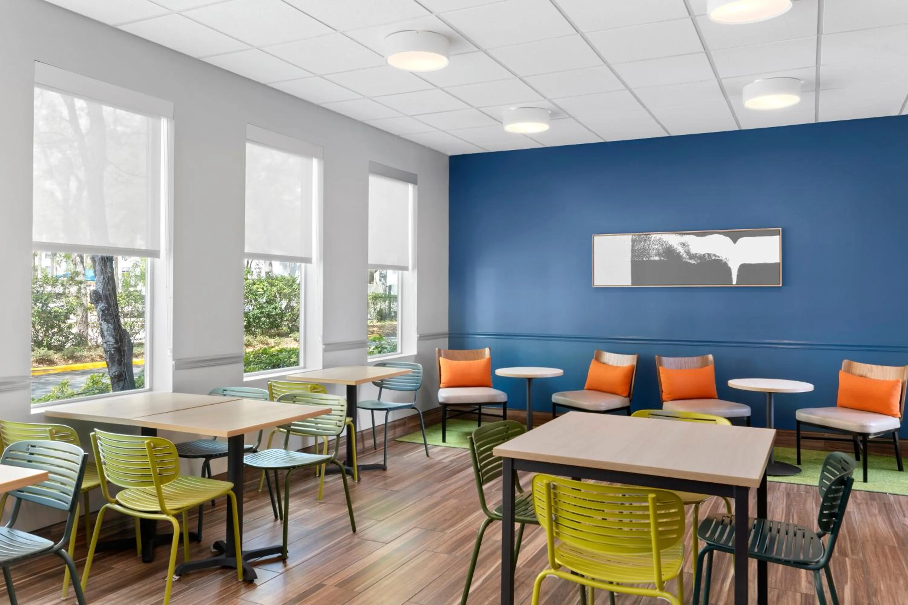 Seating area in Spark by Hilton Orlando near SeaWorld