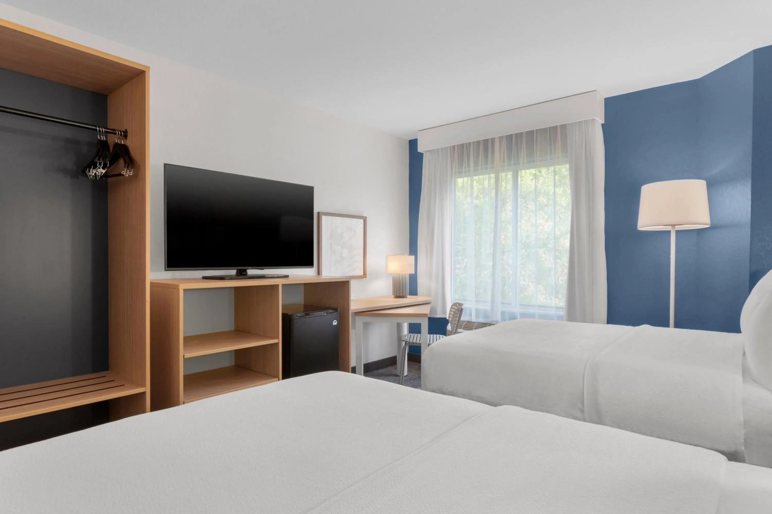 Photo of the whole room, Bed in Spark by Hilton Orlando near SeaWorld