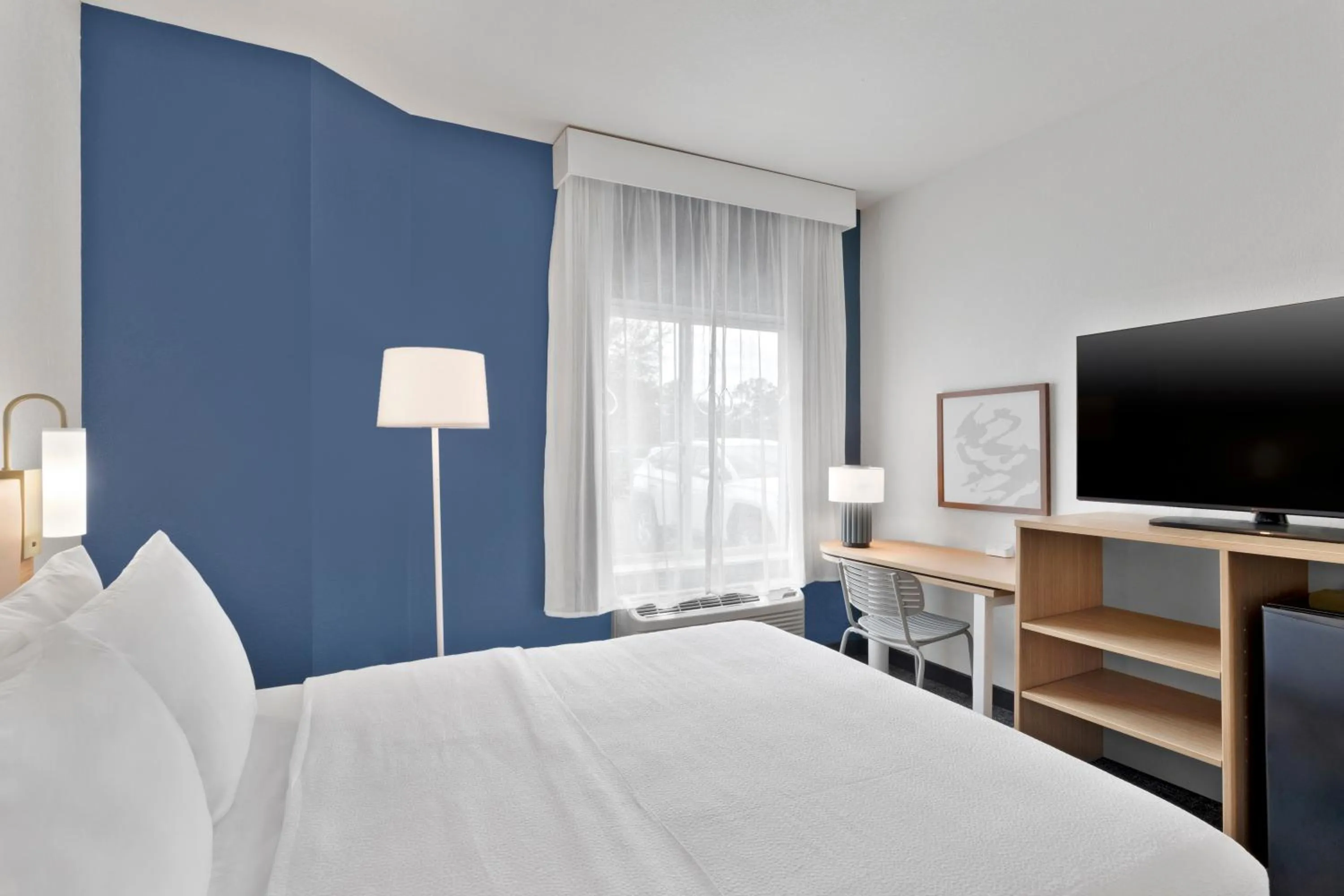 Photo of the whole room, Bed in Spark by Hilton Orlando near SeaWorld