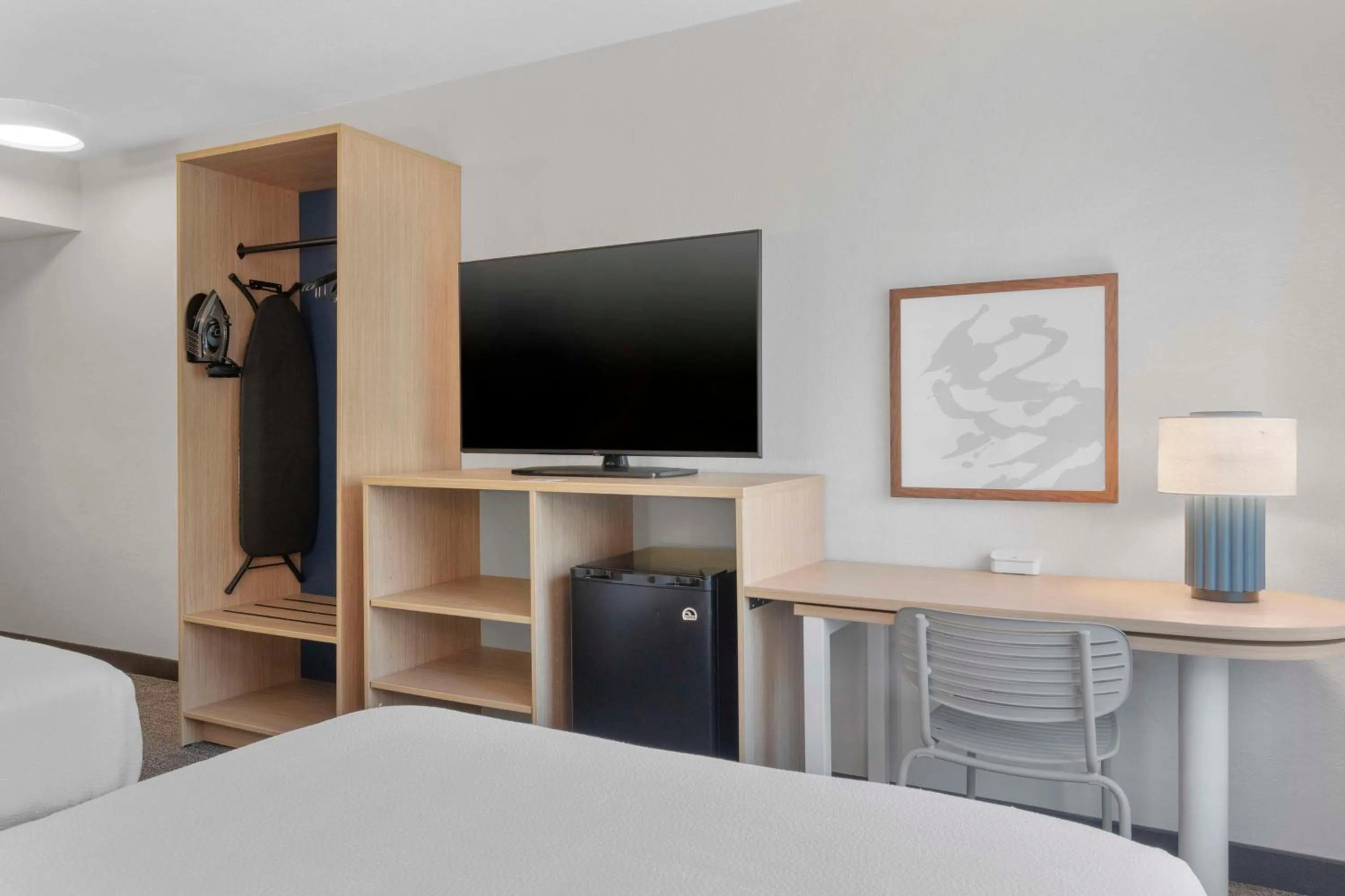 Bedroom in Spark by Hilton Orlando near SeaWorld