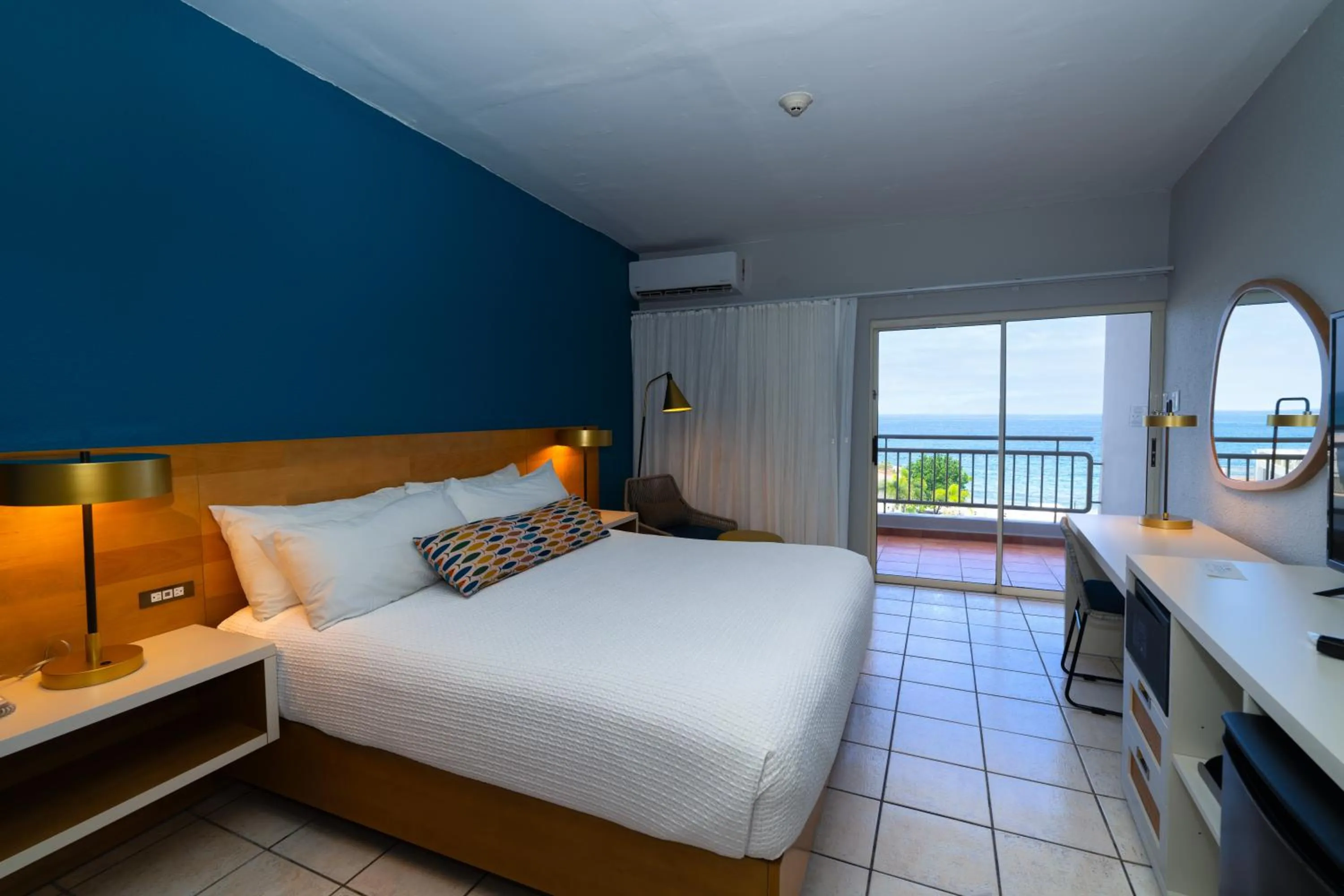 Bed in Rincon of the Seas Grand Caribbean Hotel