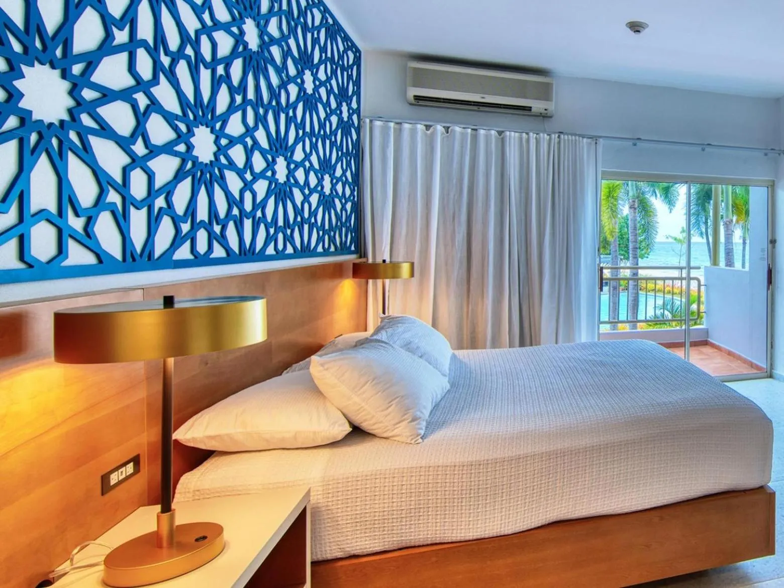 Bedroom, Bed in Rincon of the Seas Grand Caribbean Hotel