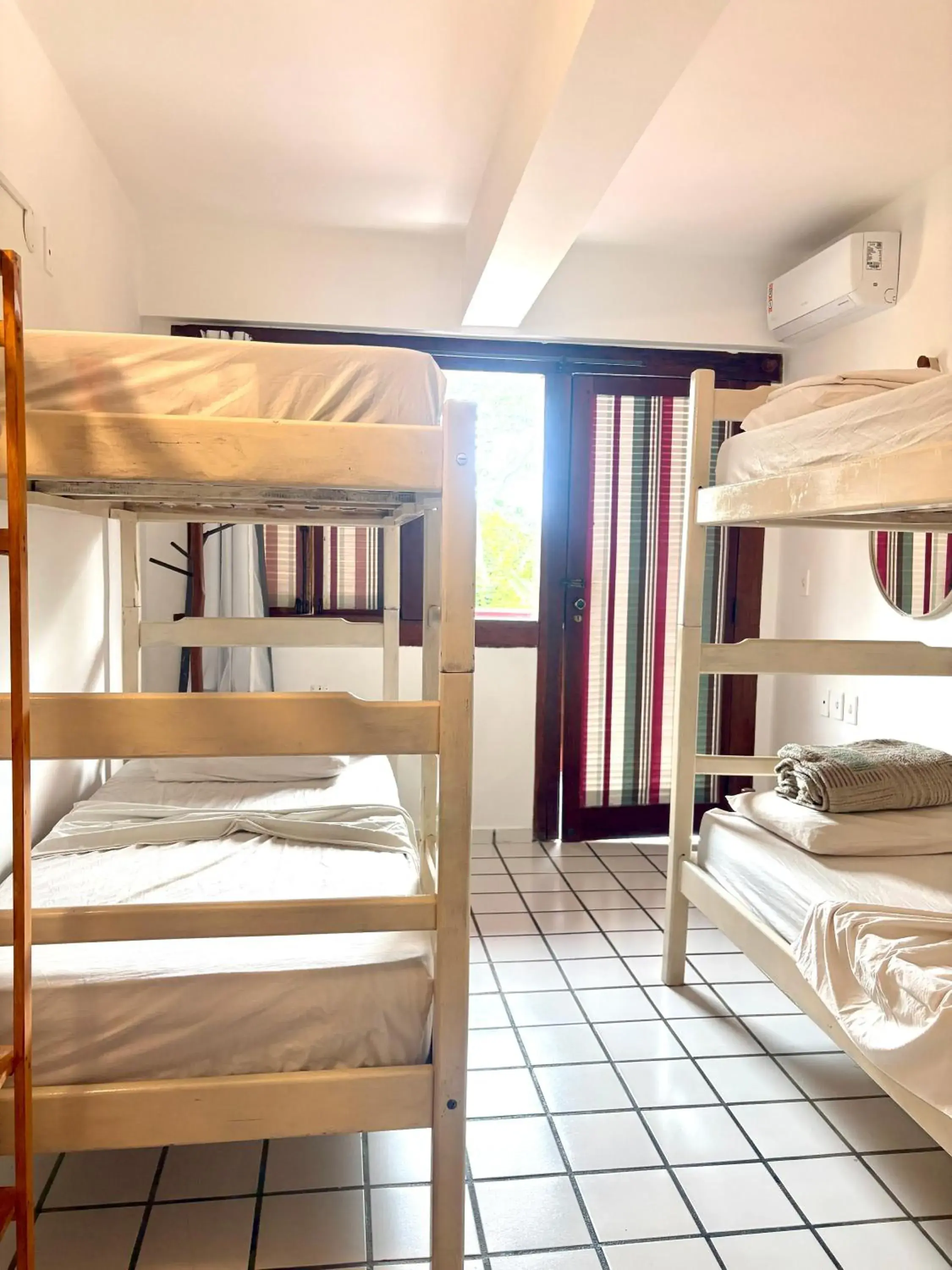 Bed in 4-Bed Female Dormitory Room in Novos Baianos Hostel e Pousada Bed in 4-Bed Female Dormitory Room in Novos Baianos Hostel e Pousada