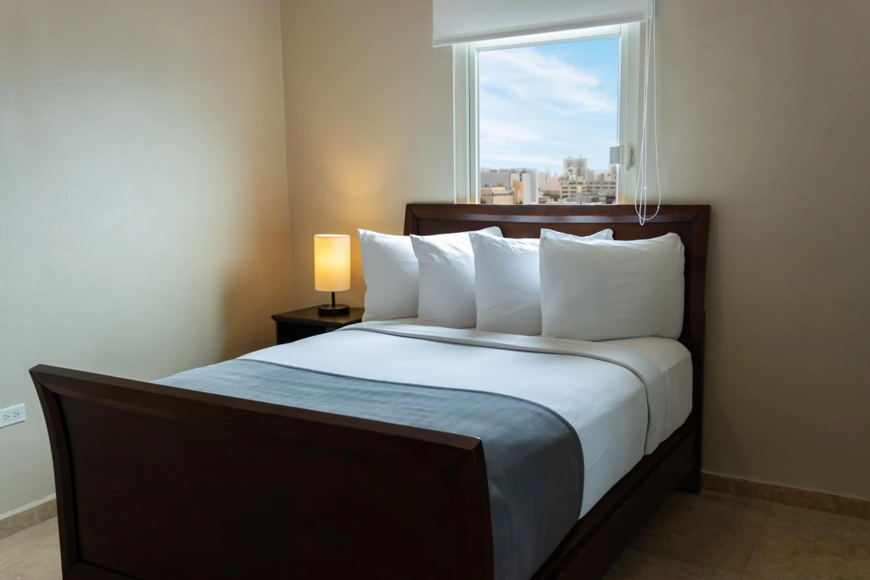 Bed in Ciqala Suites Hotel - San Juan