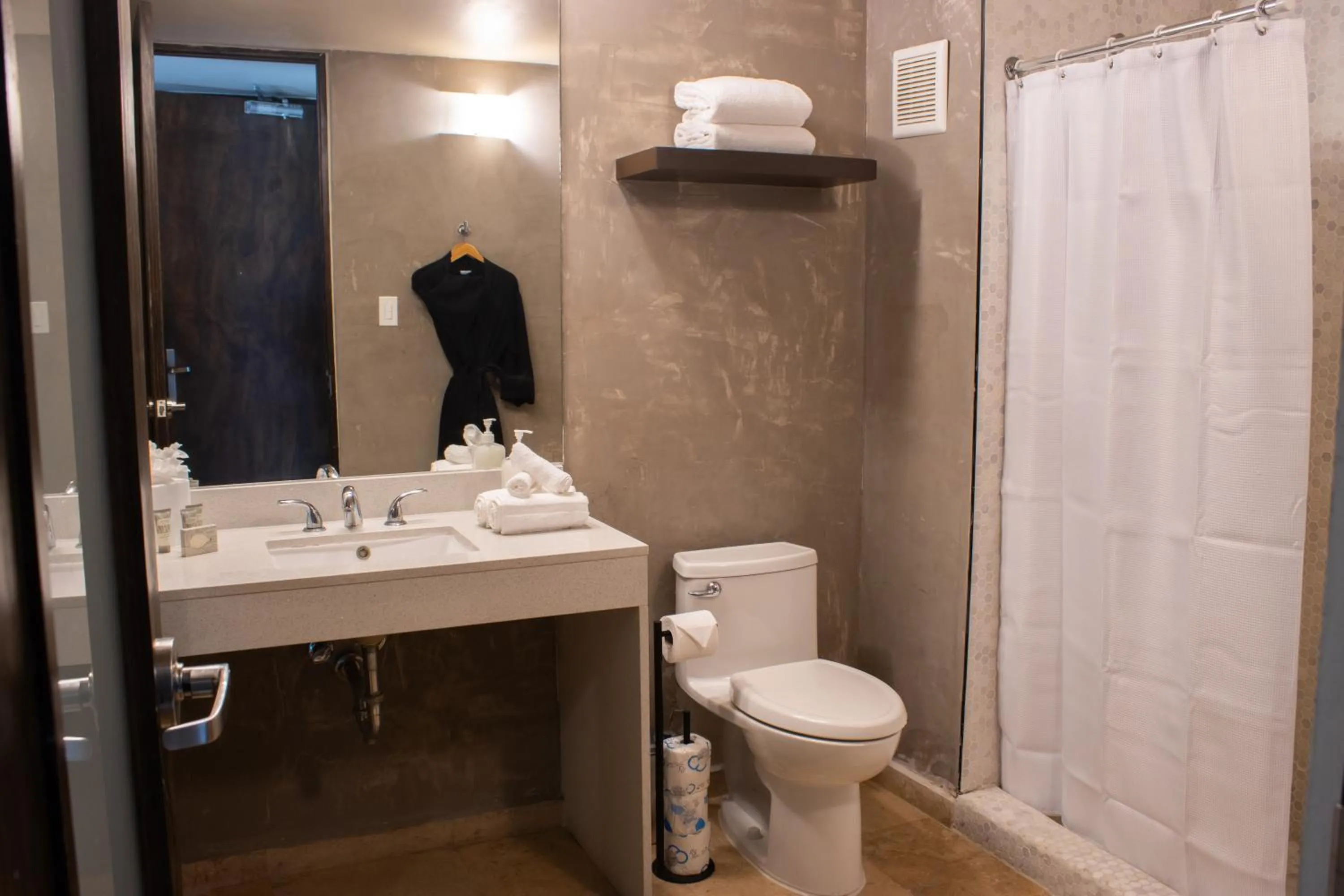 Shower in Ciqala Suites Hotel - San Juan