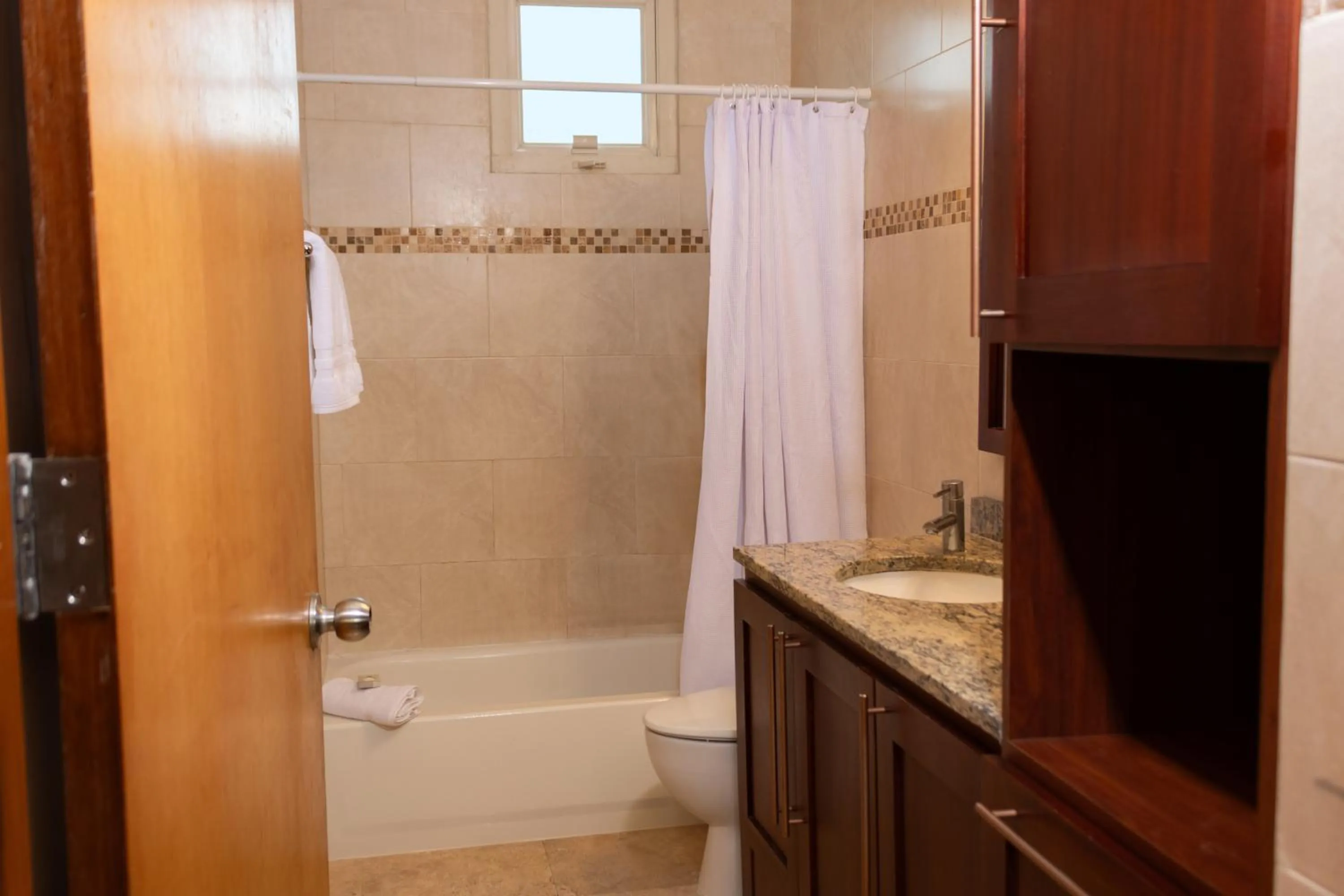 Toilet in Ciqala Suites Hotel - San Juan