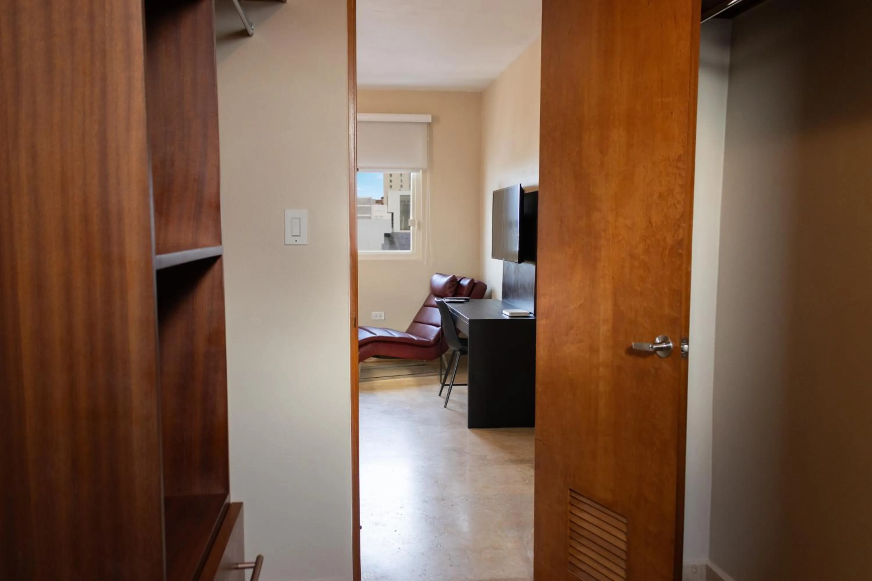 wardrobe, Bed in Ciqala Suites Hotel - San Juan