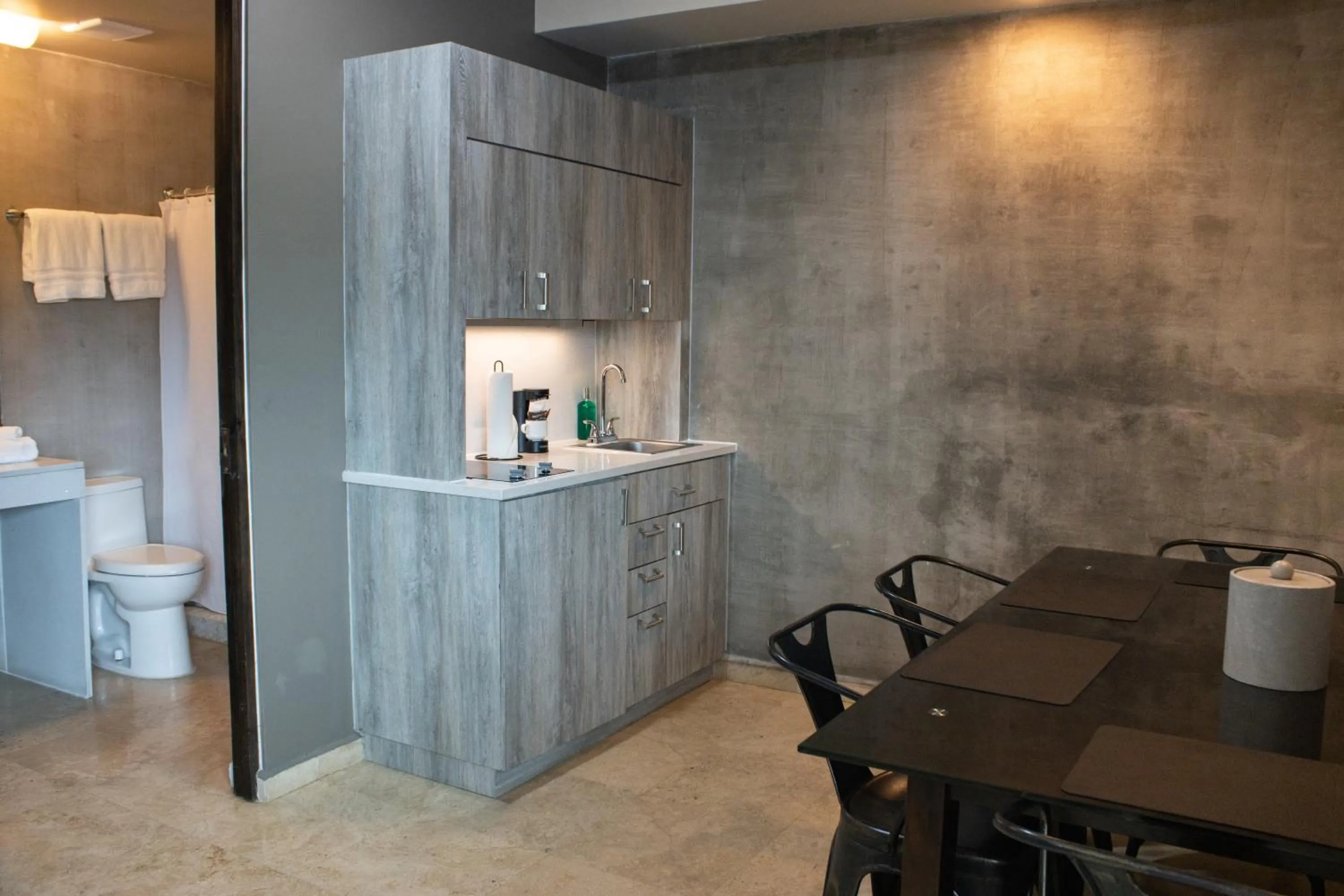 Kitchen or kitchenette in Ciqala Suites Hotel - San Juan