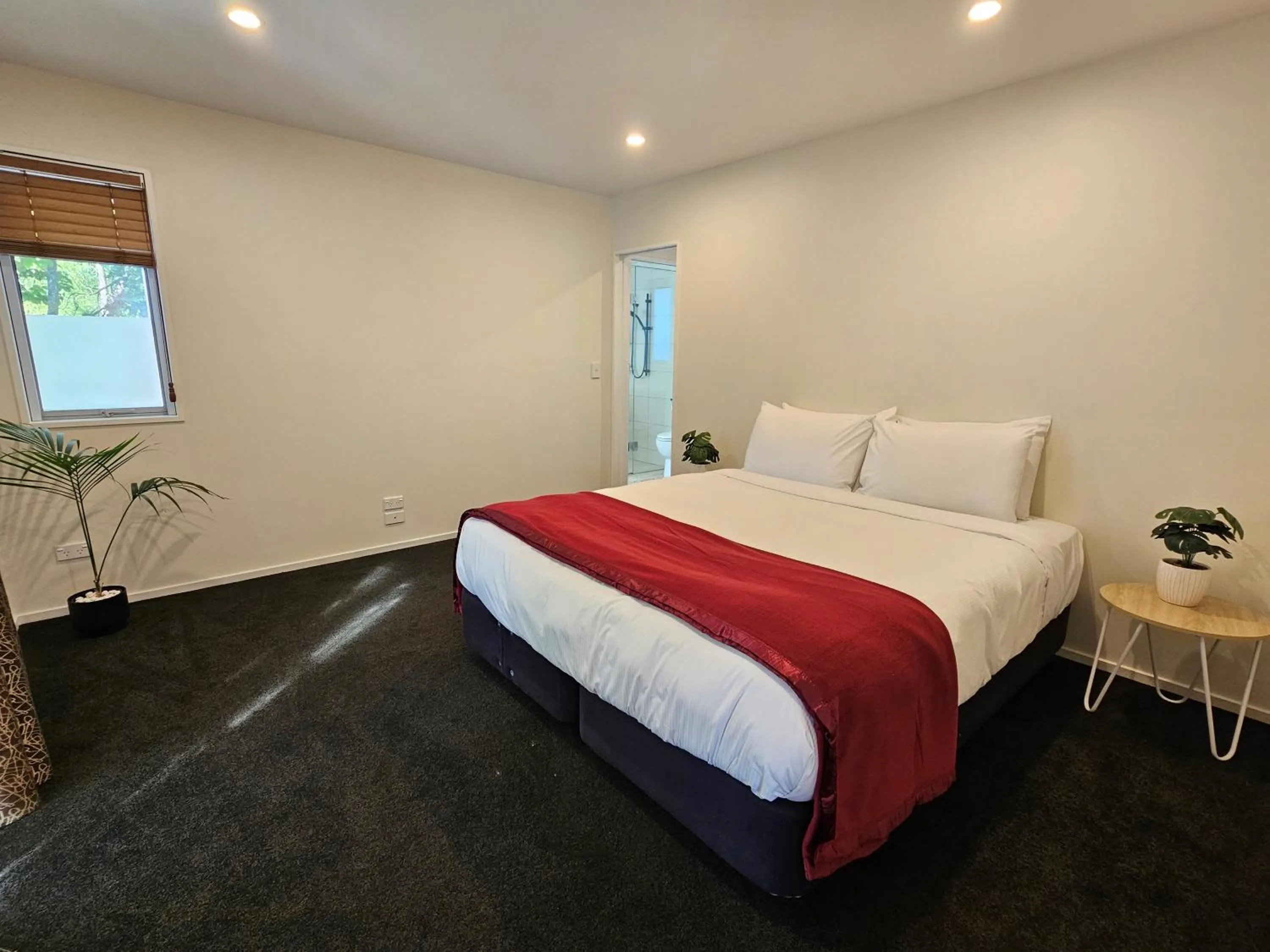 Bed in Azena Suites & Apartment