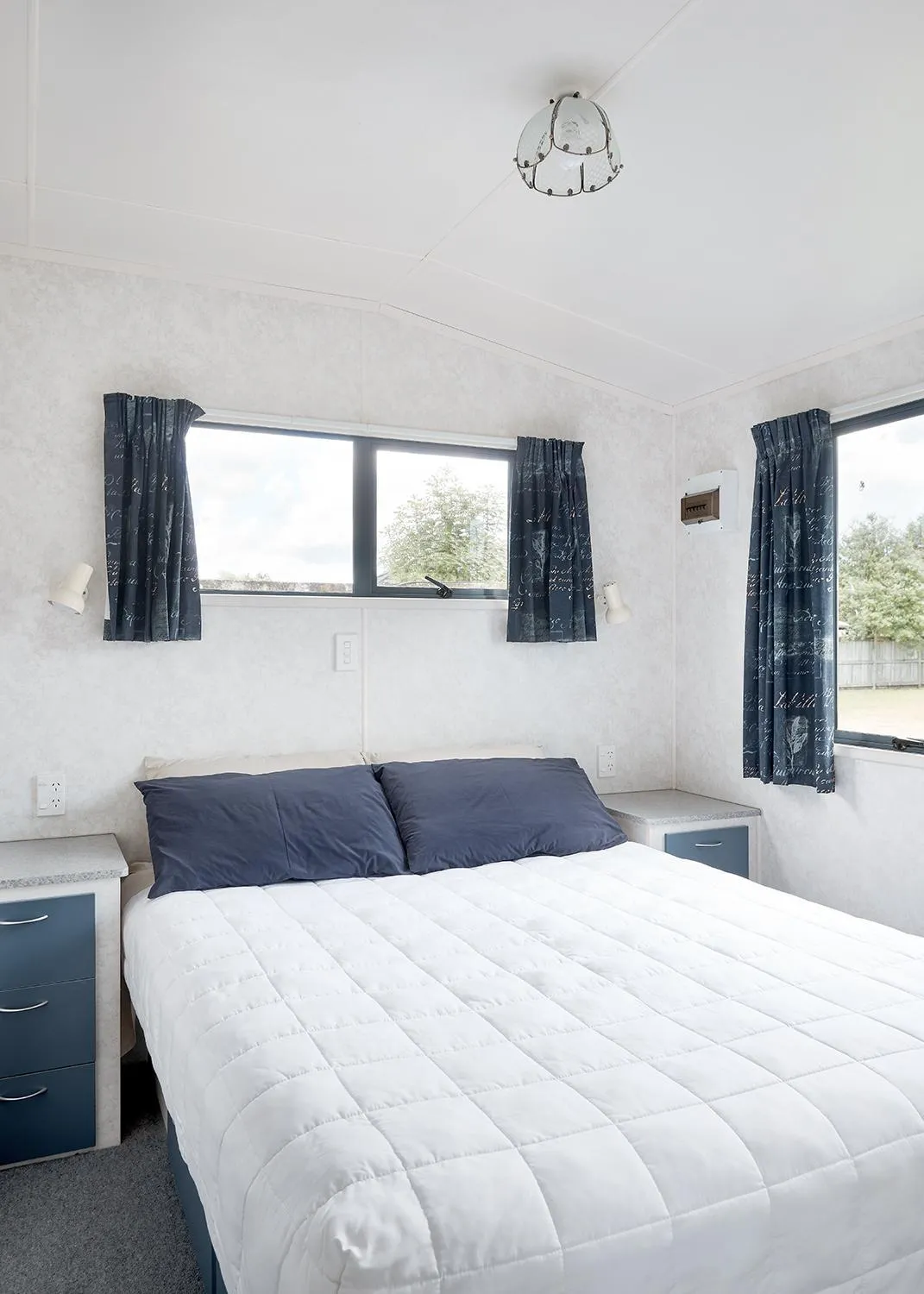 Photo of the whole room, Bed in Mercury Bay Holiday Park