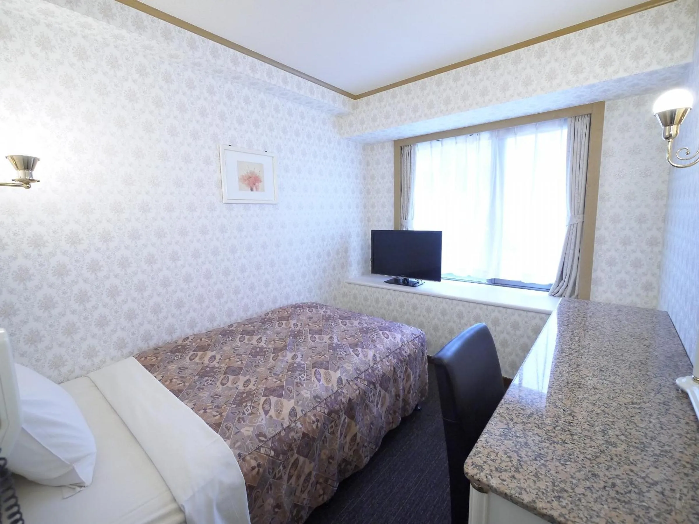 Photo of the whole room, Bed in U-Community Hotel