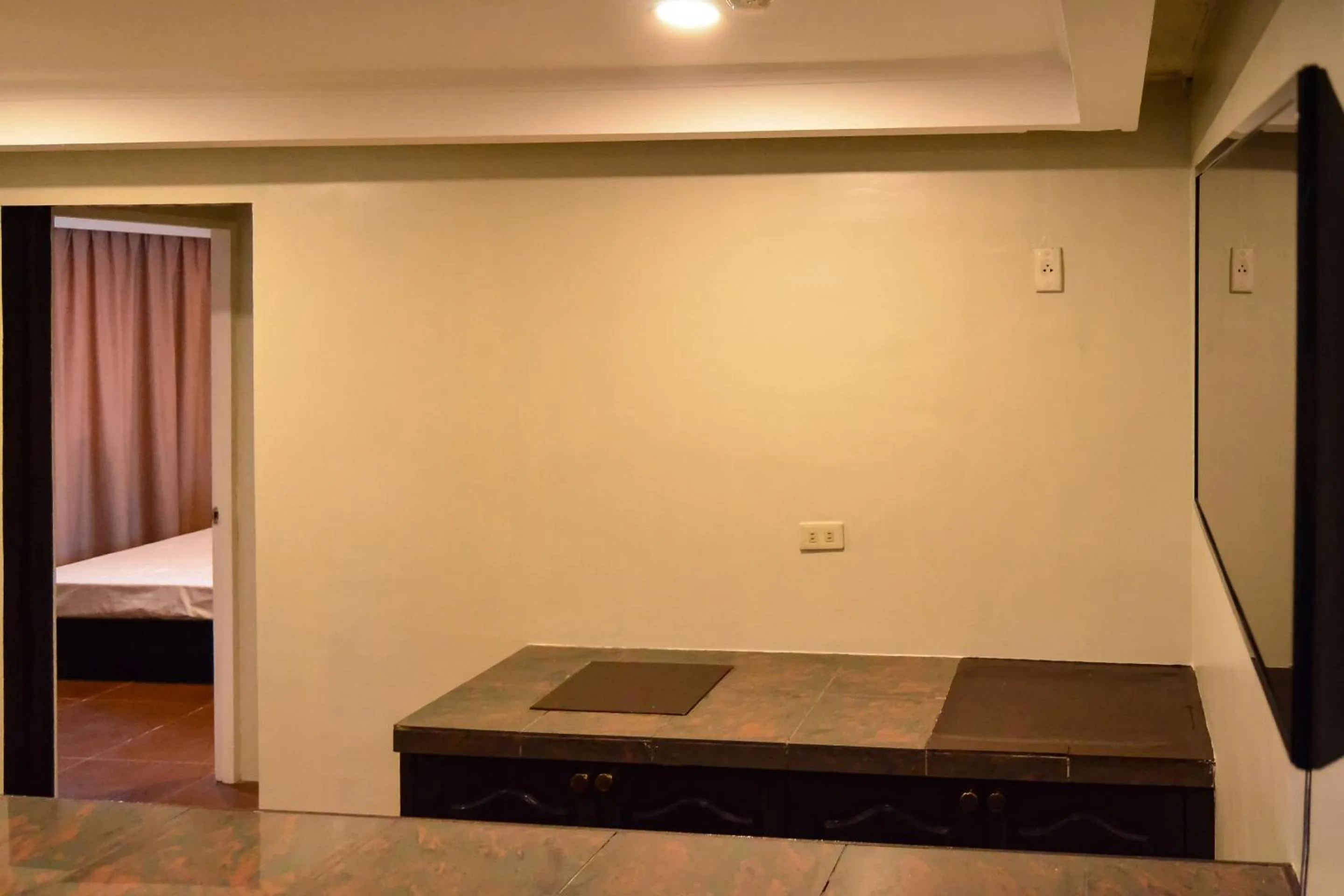 Bedroom in Super OYO 791 Bell Mansion