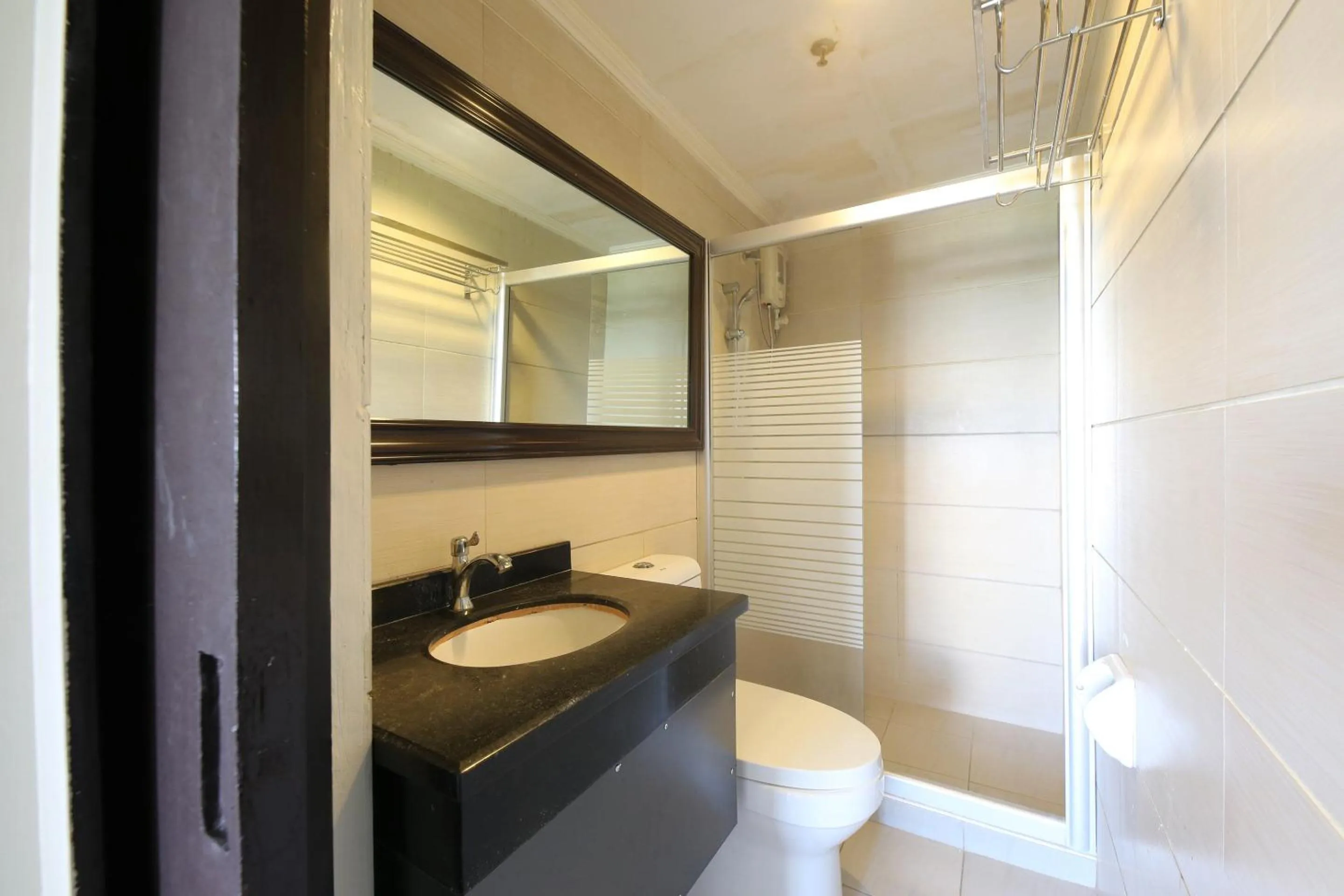 Bedroom in Super OYO 791 Bell Mansion