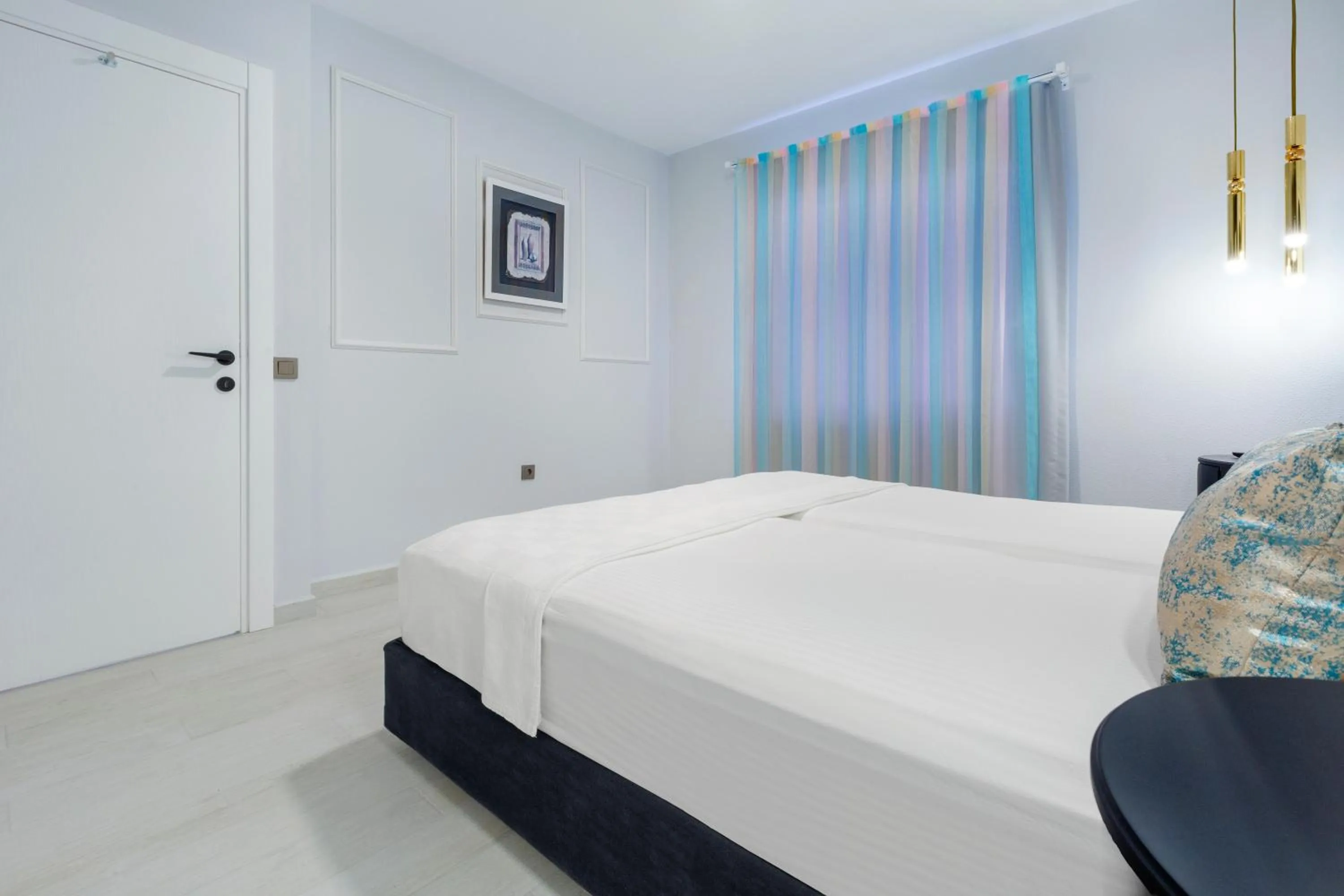 Bed in Twin Apart Hotel