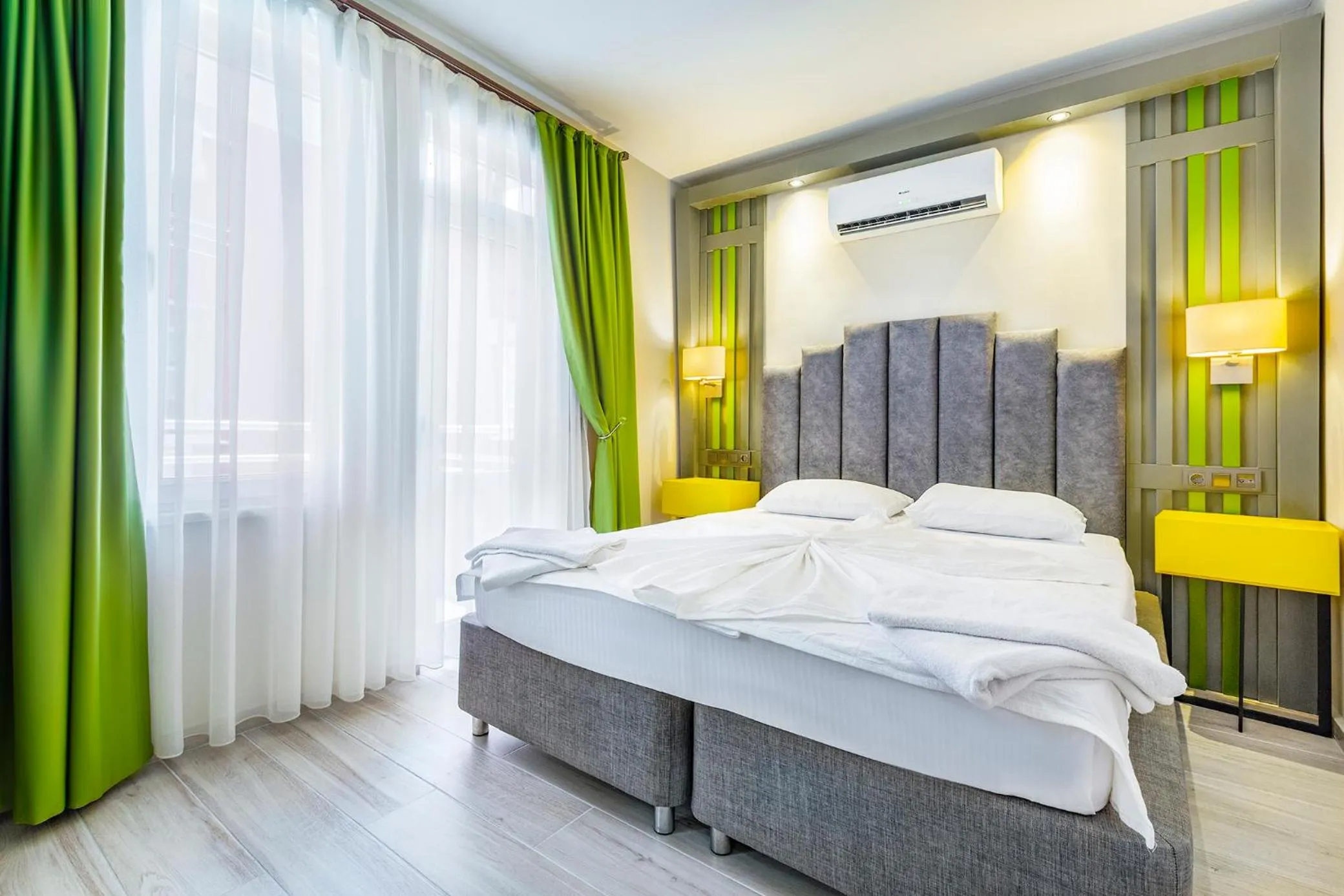 Bed in Twin Apart Hotel