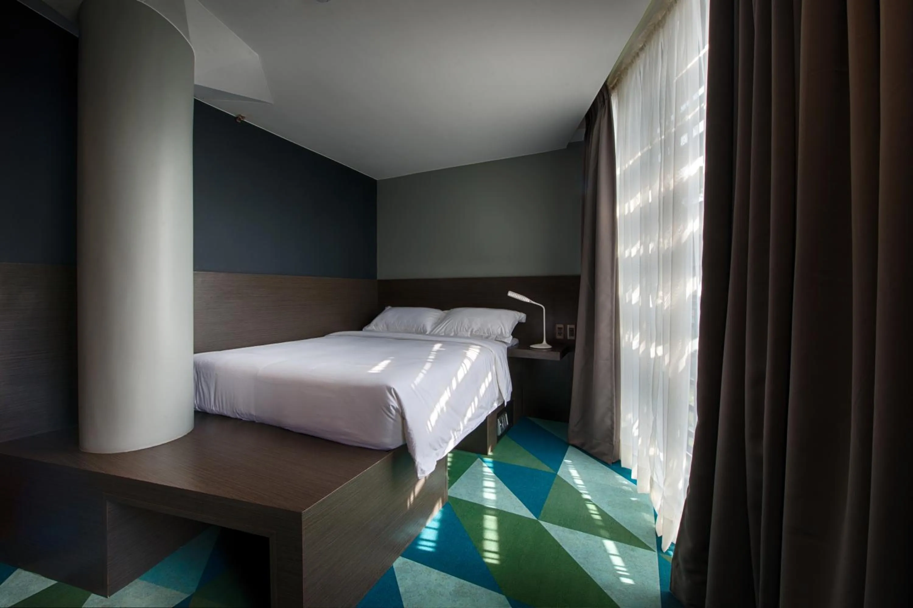 Bed in G1 Lodge Design Hotel