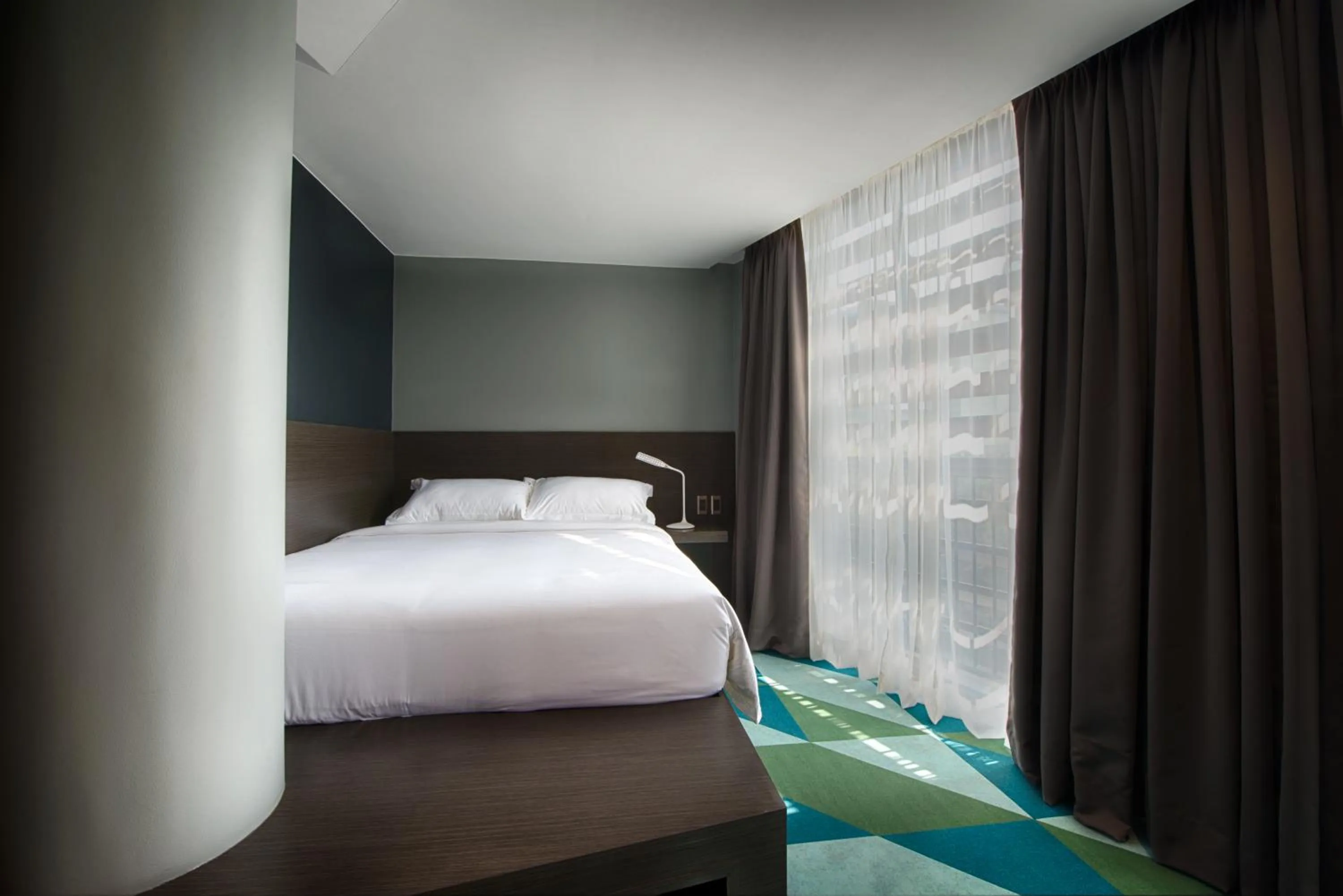 Bed in G1 Lodge Design Hotel