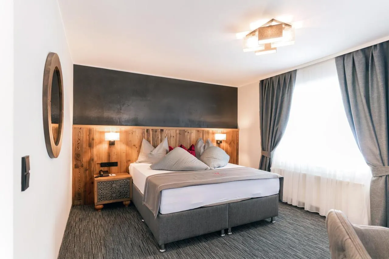 Photo of the whole room, Bed in Waidringer Hof 4 Sterne Superior