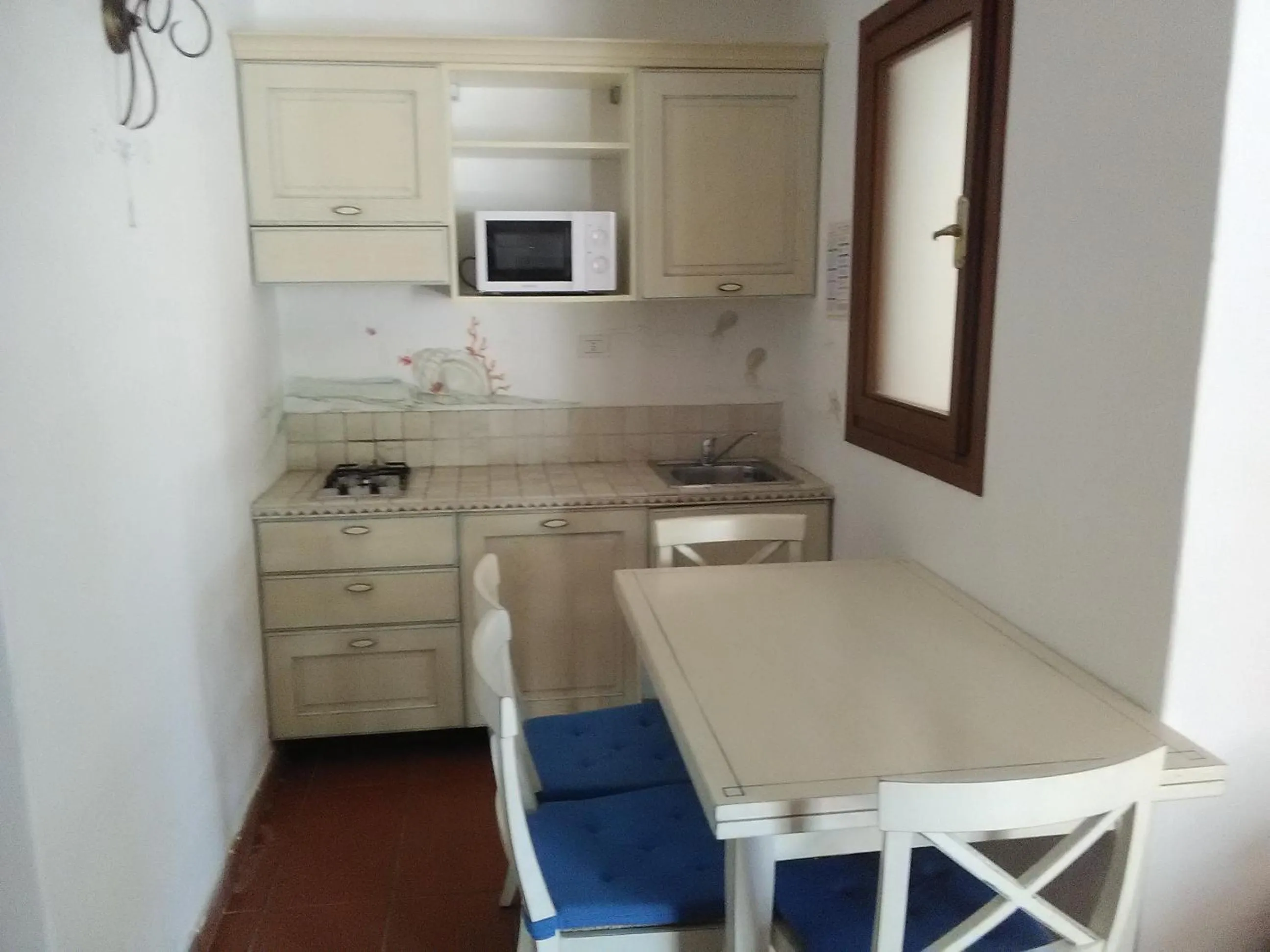 Kitchen or kitchenette in White Sand Residence