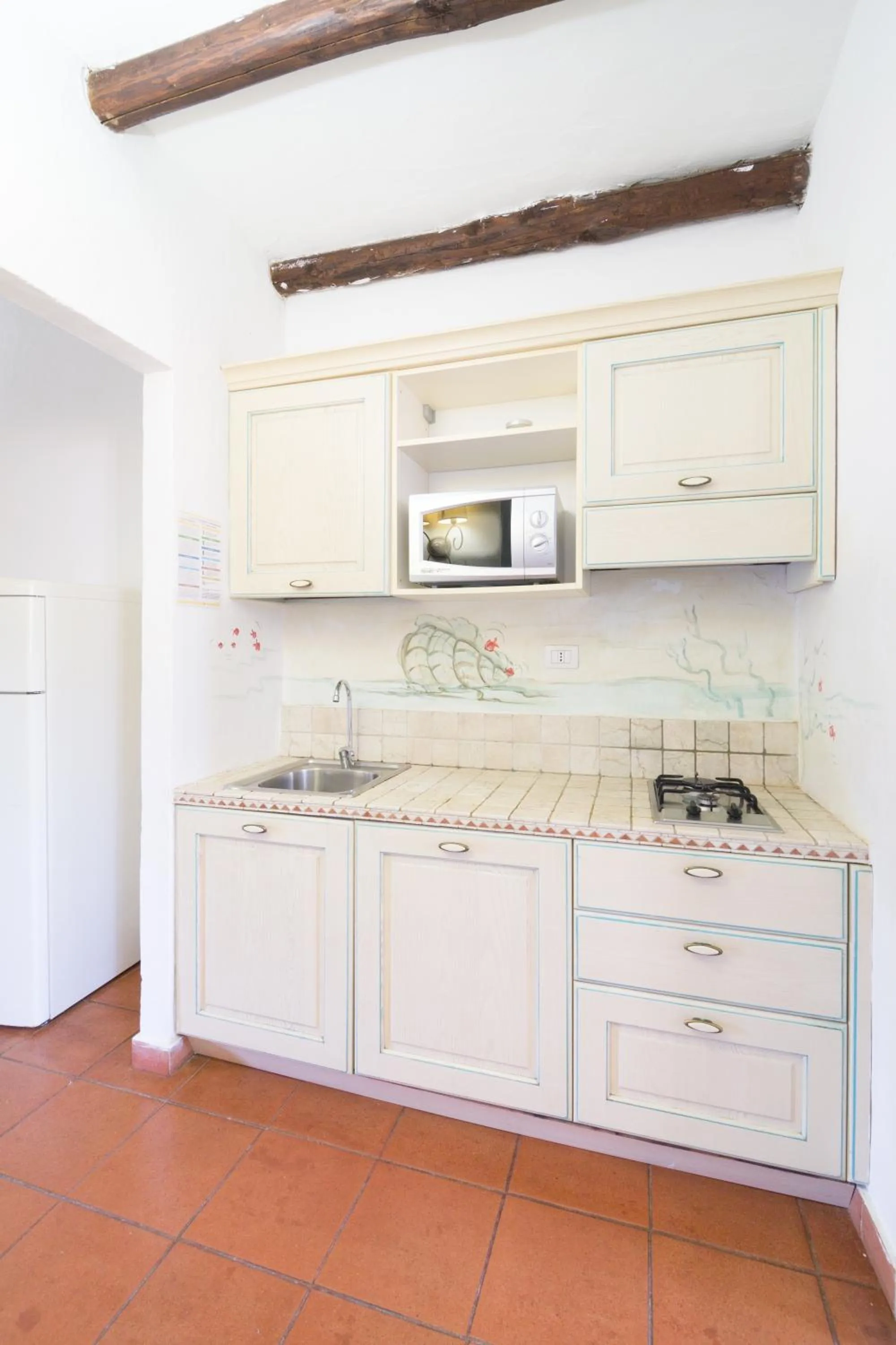 Kitchen or kitchenette in White Sand Residence