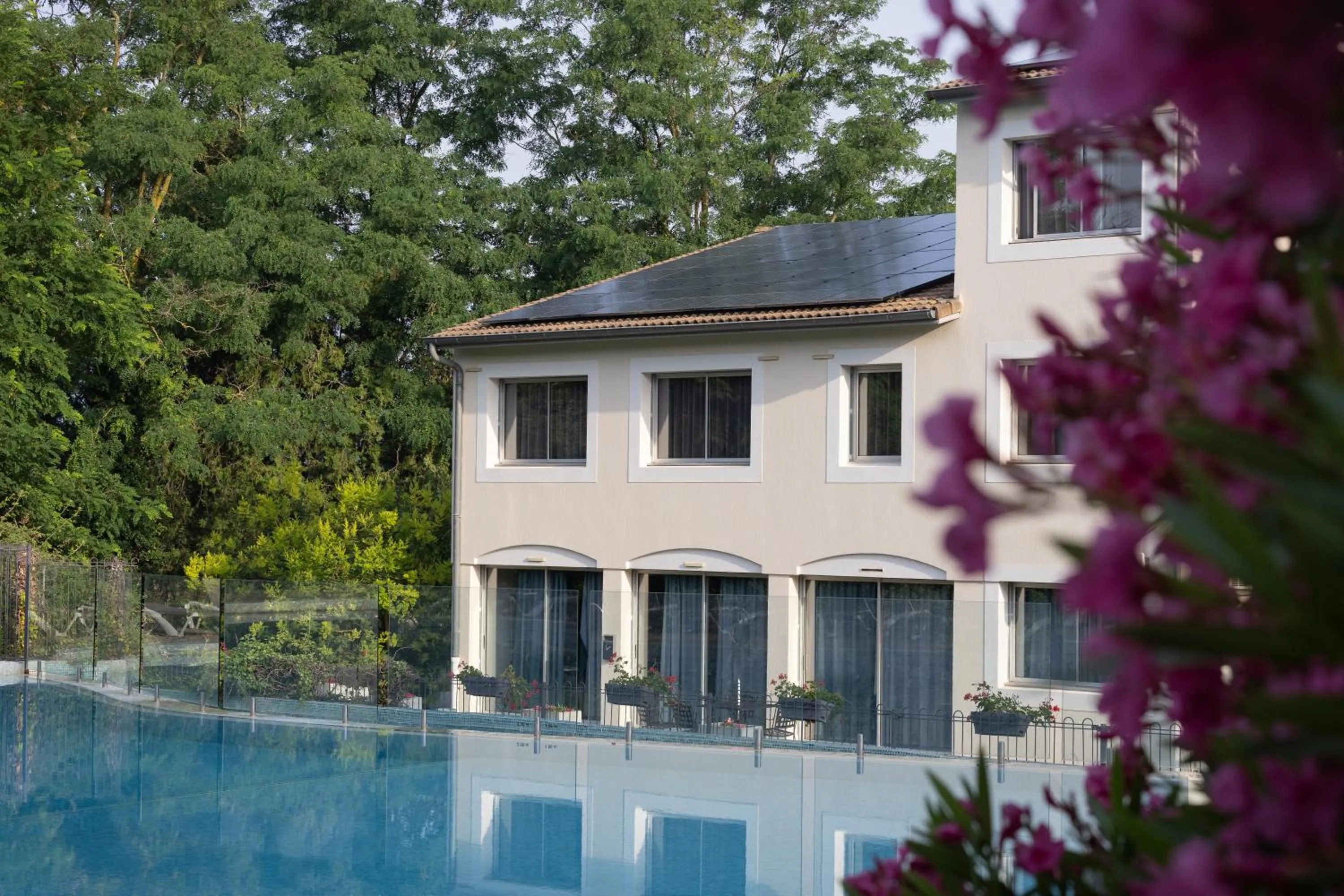 Property building in Logis Hotel Restaurant SPA Les Oliviers