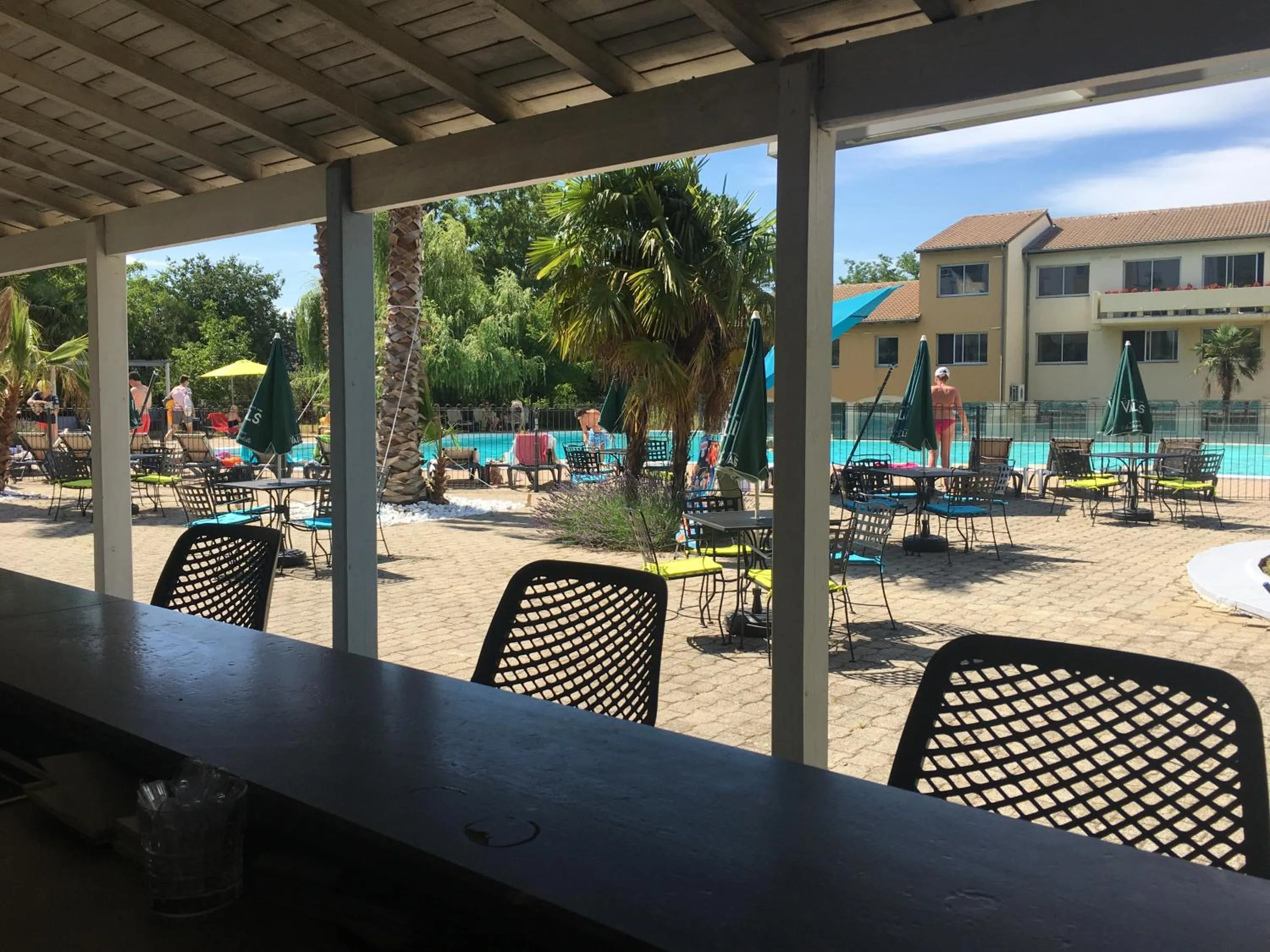 Patio in Logis Hotel Restaurant SPA Les Oliviers