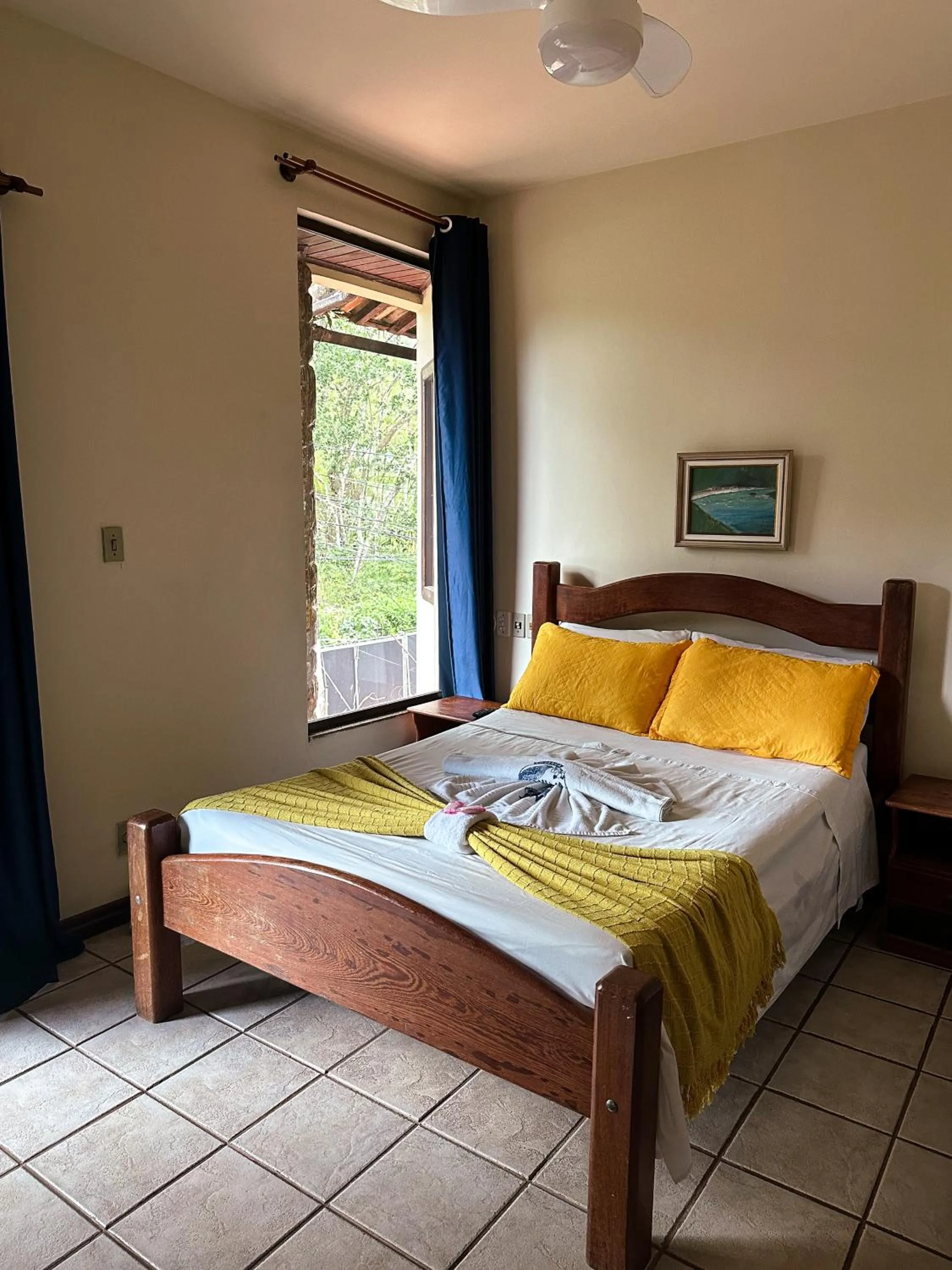 Bed in Pousada Sanhaço