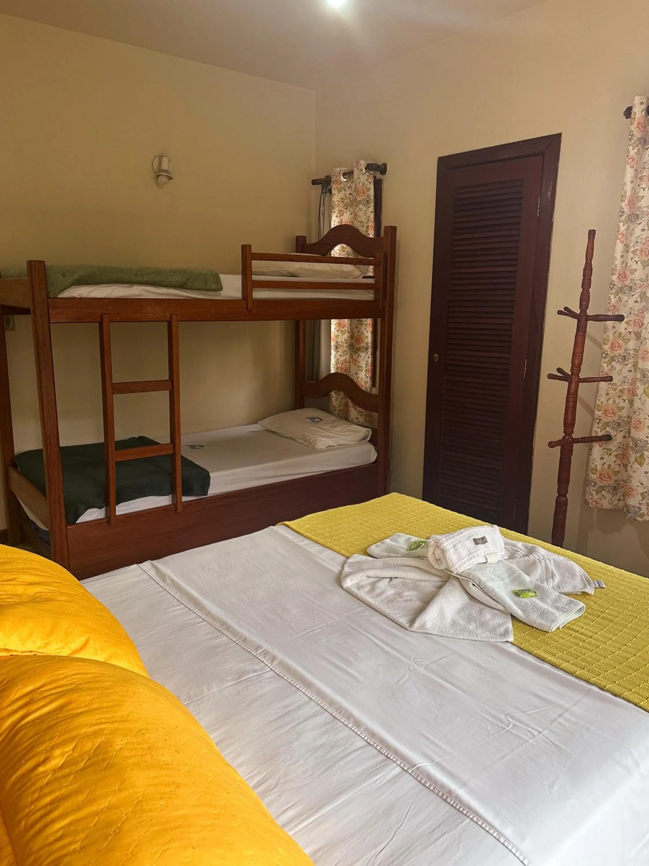 Bed in Pousada Sanhaço