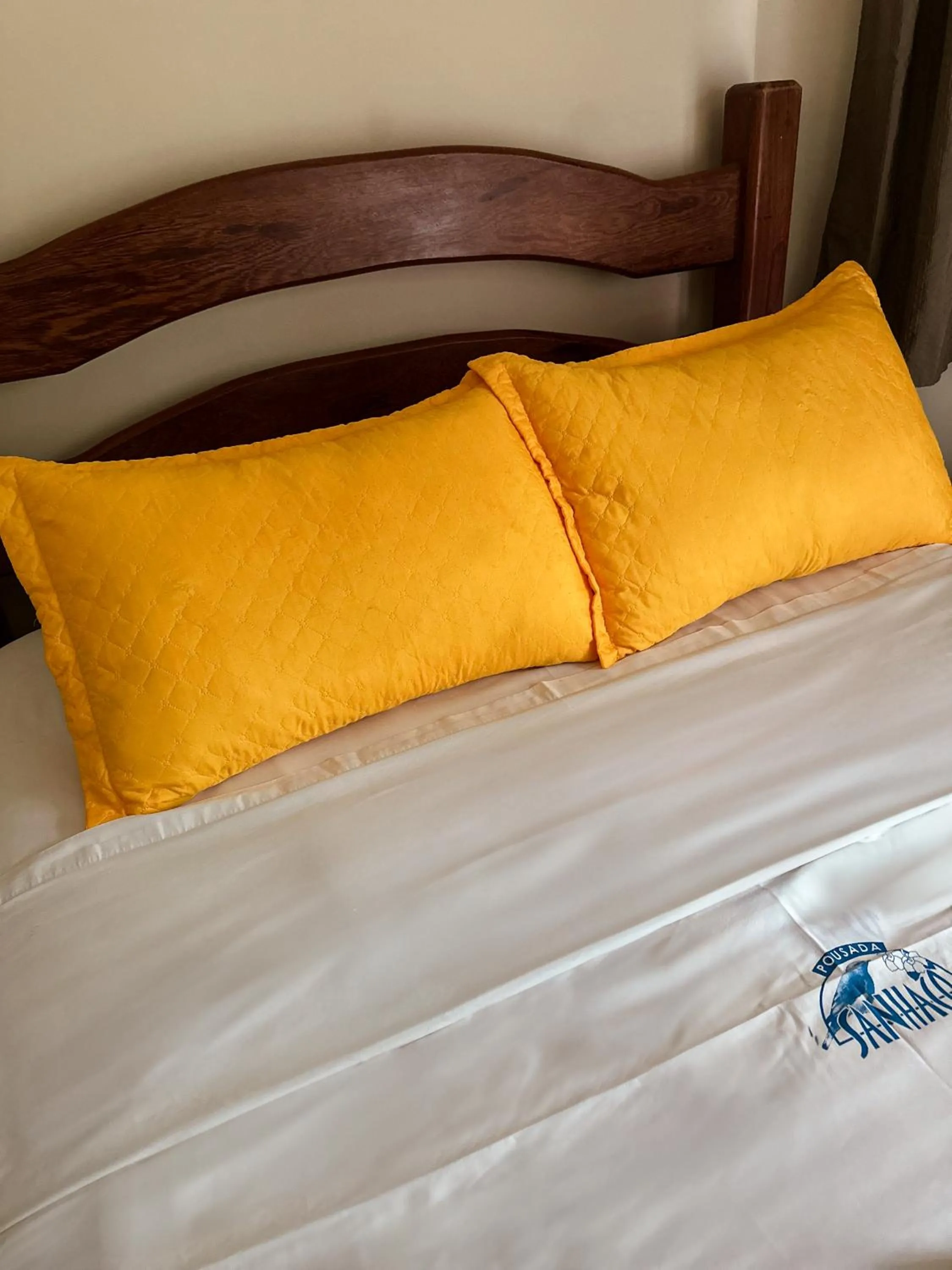 Bed in Pousada Sanhaço