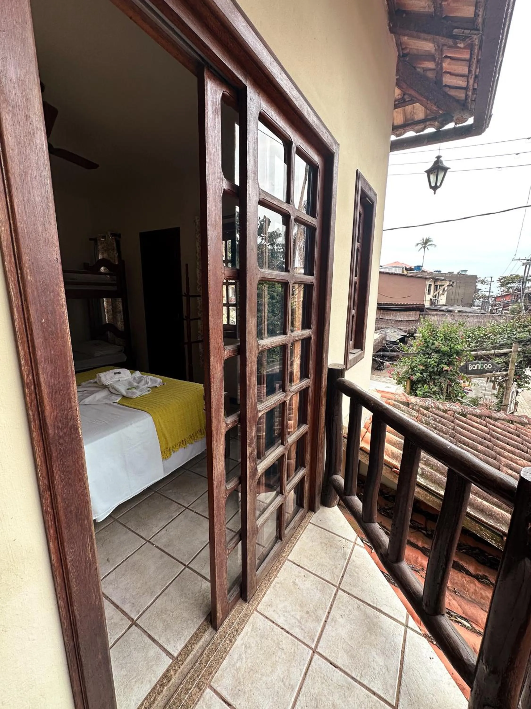 Bed in Pousada Sanhaço